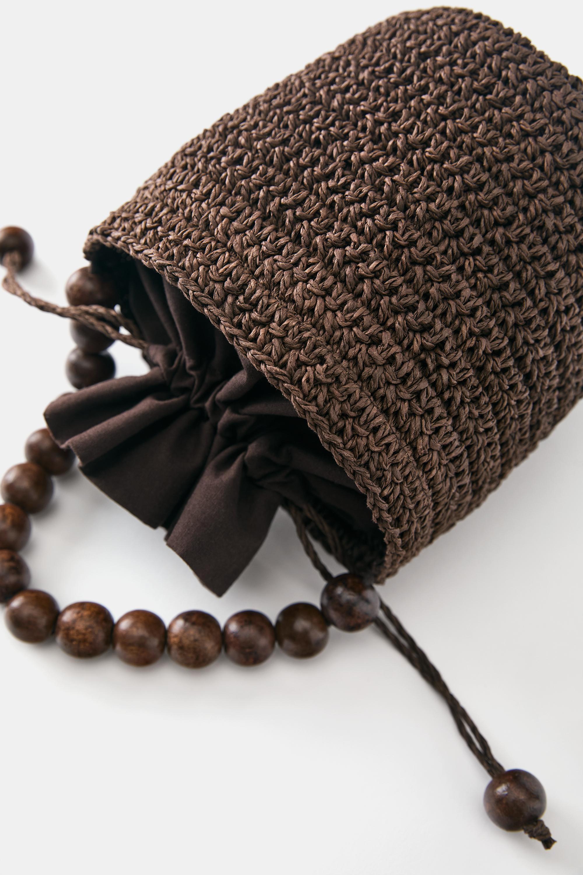 Beaded bucket handbag — Brown