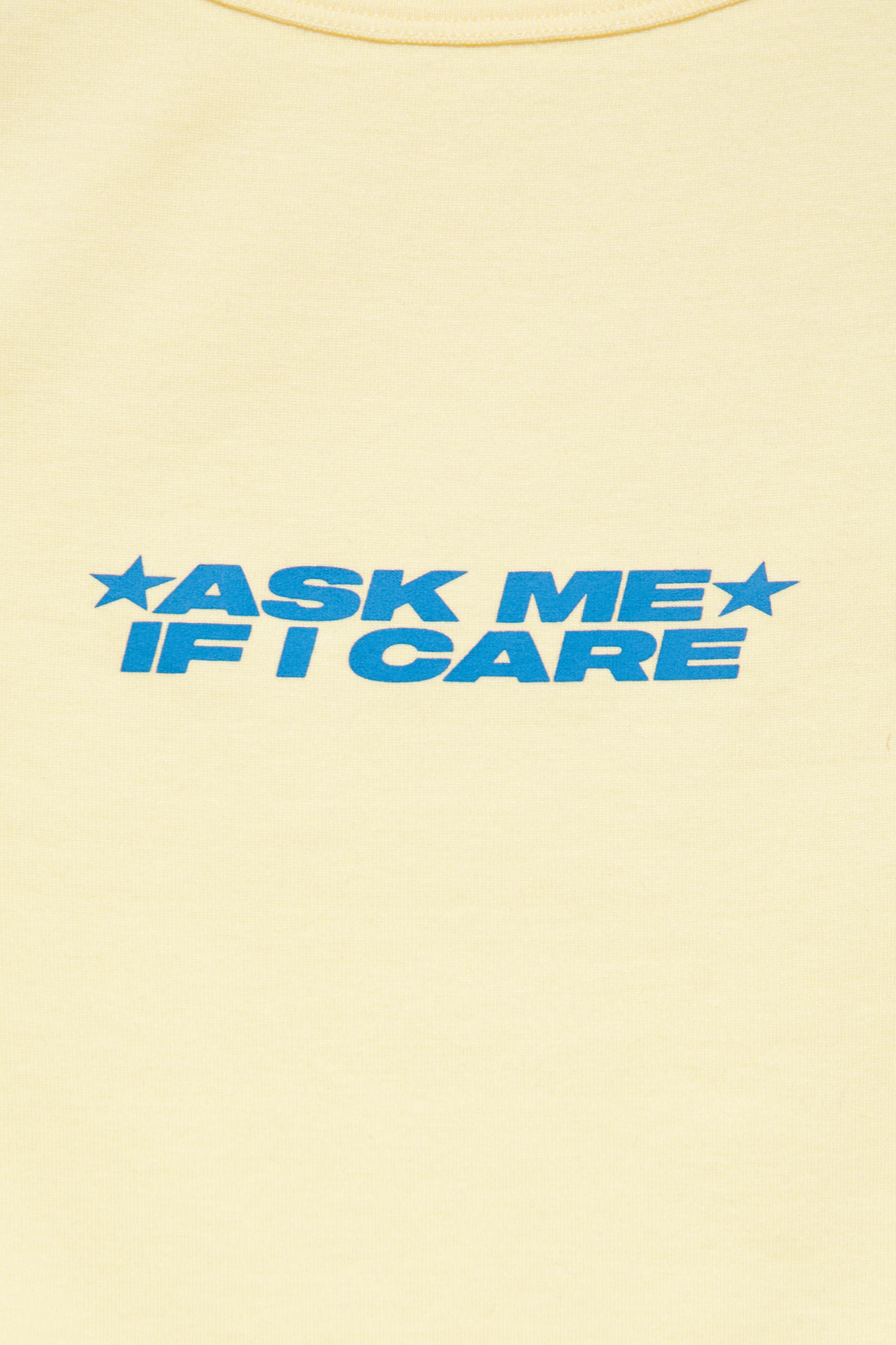 Yellow slogan tank top — Pale yellow