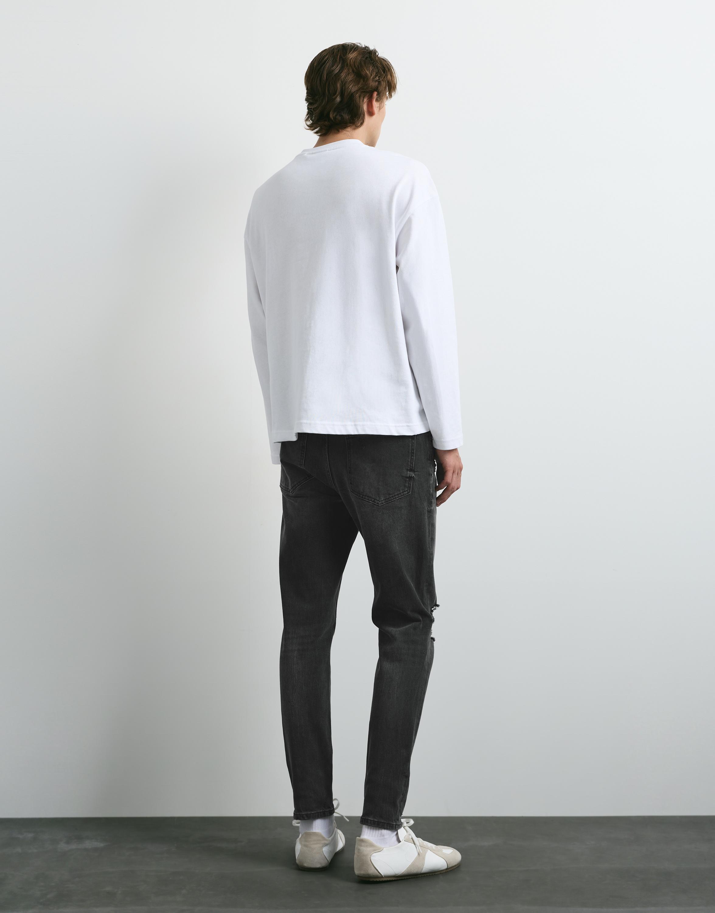Ripped skinny jeans — Faded black
