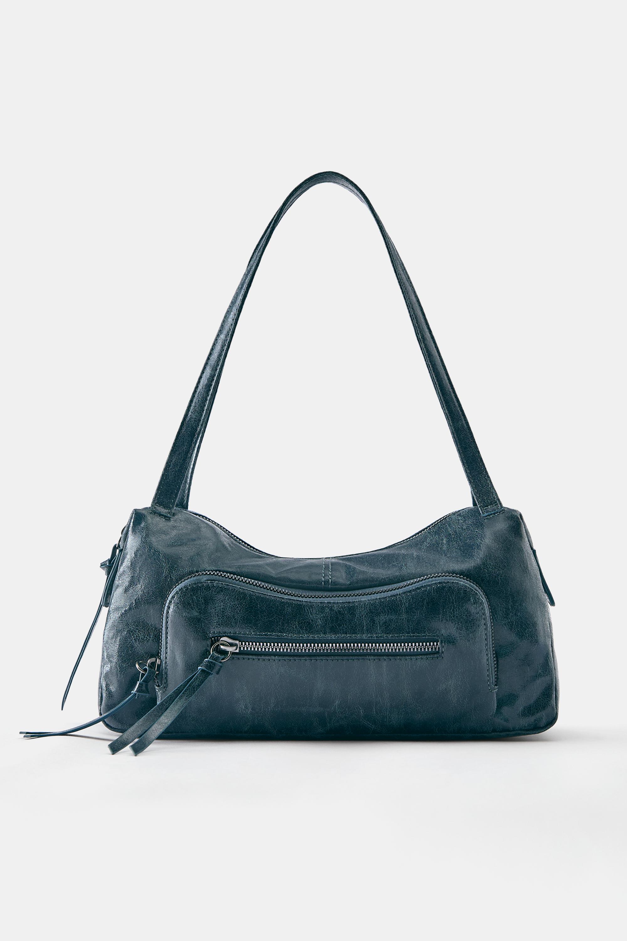 Bolso de hombro desgastado