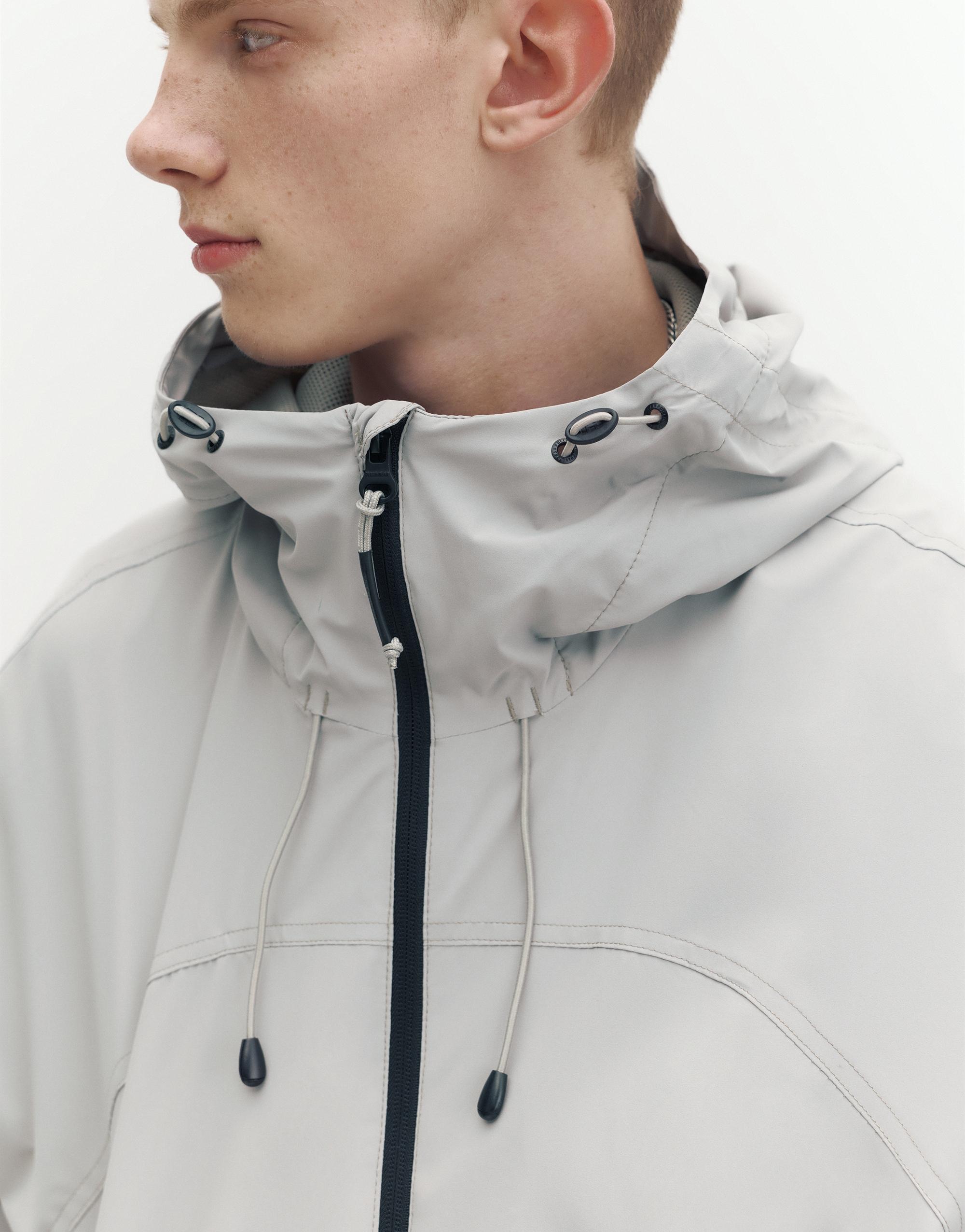 Lightweight hooded raincoat — Pale marl