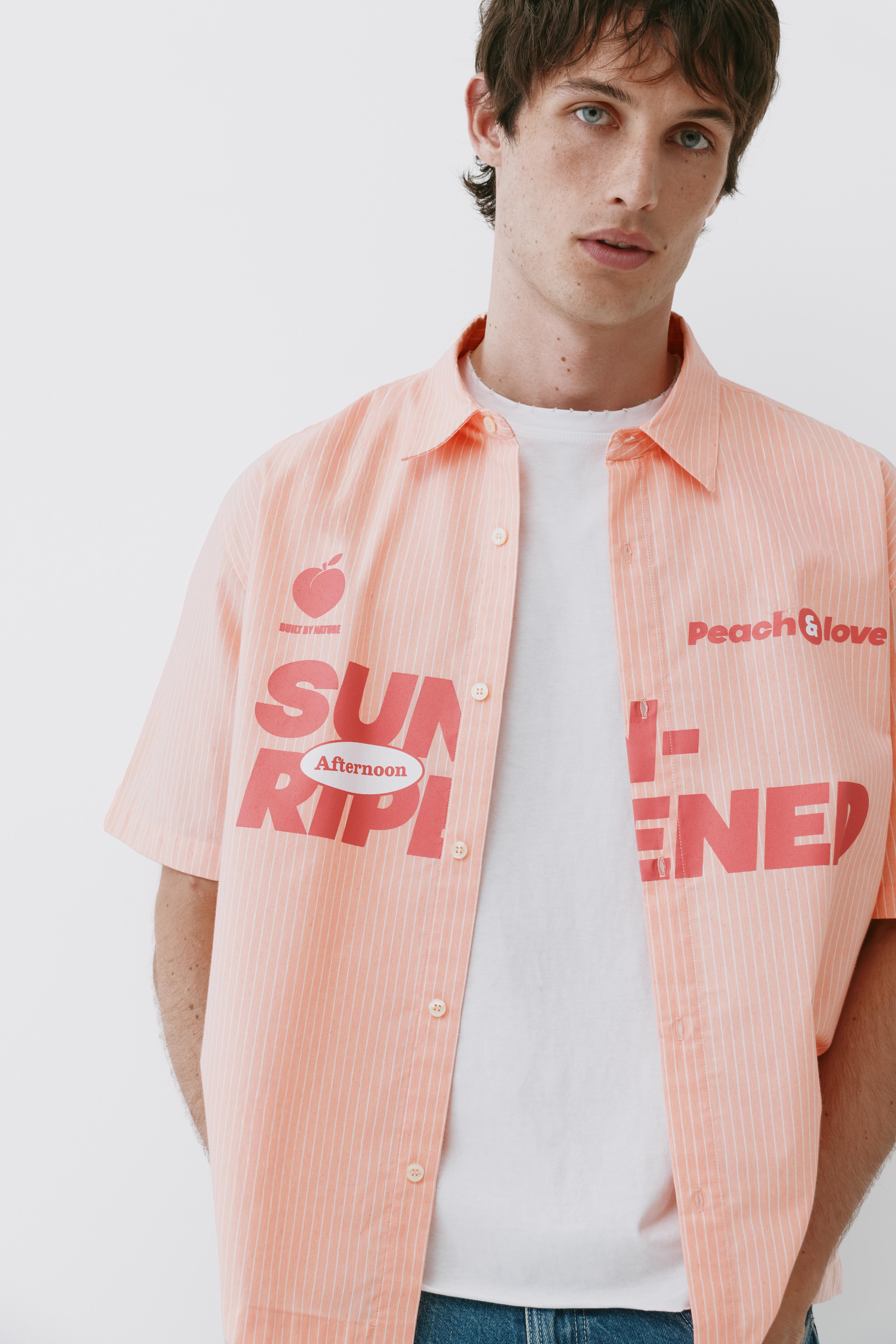 Peach striped graphic shirt — Chalk pink