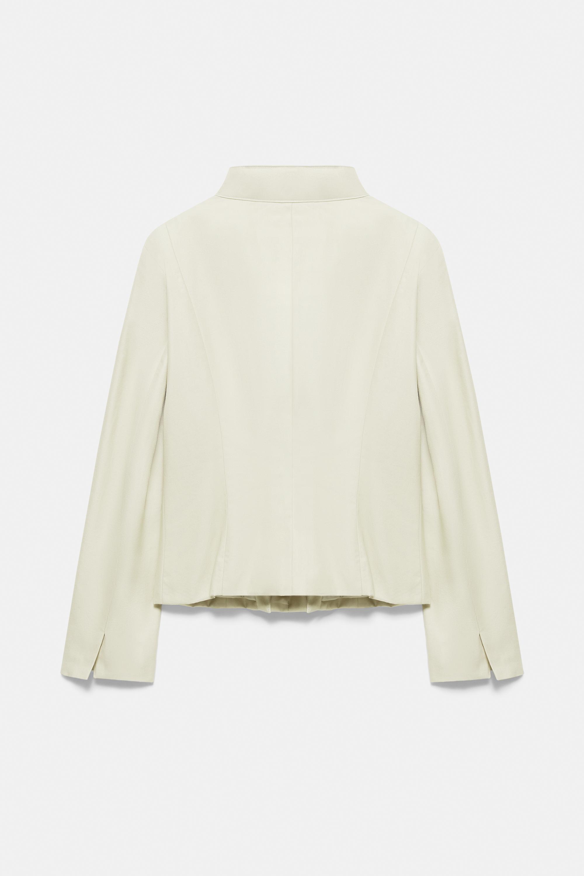 Fitted high neck jacket — Sand