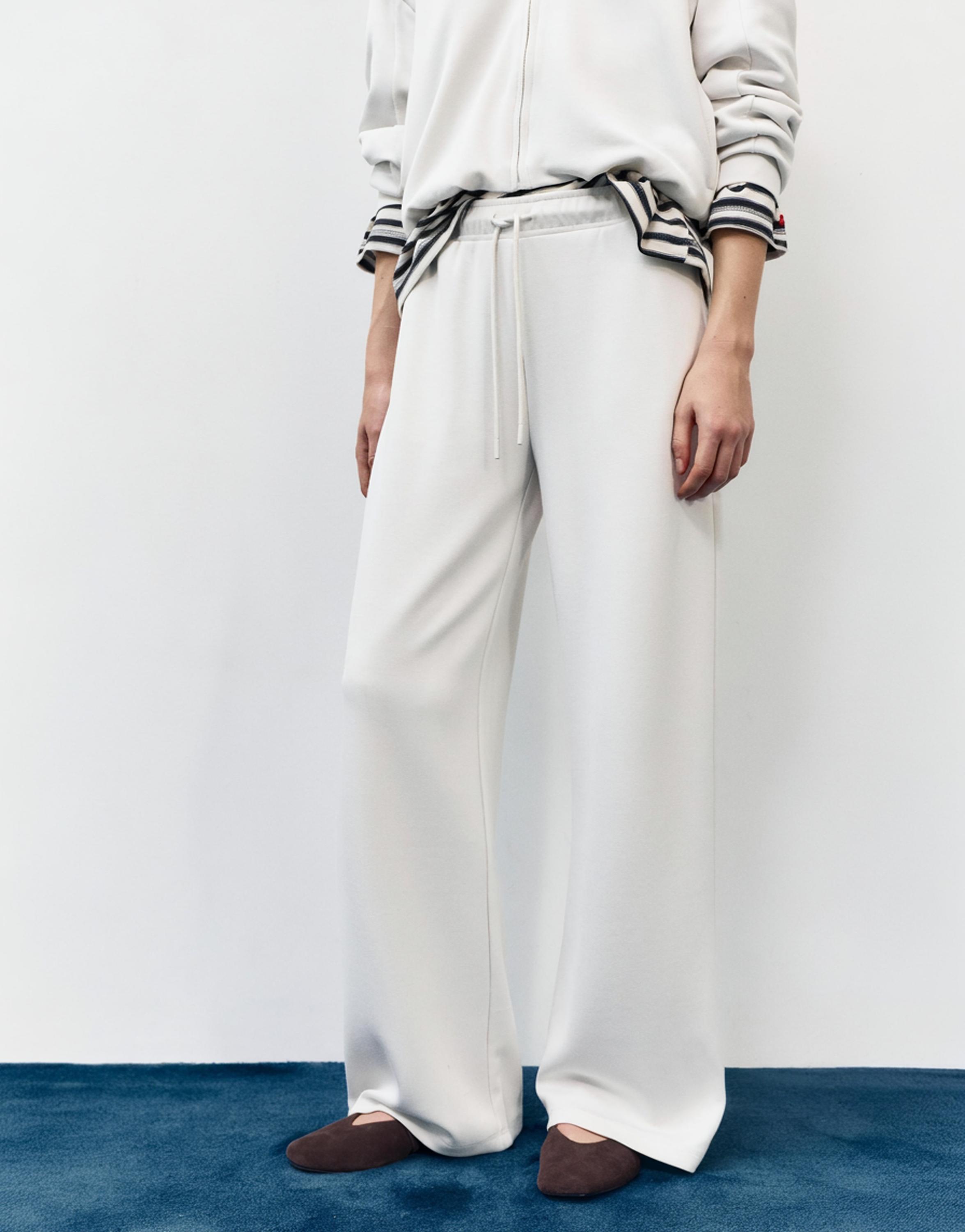 Soft-touch wide-leg trousers — Ecru