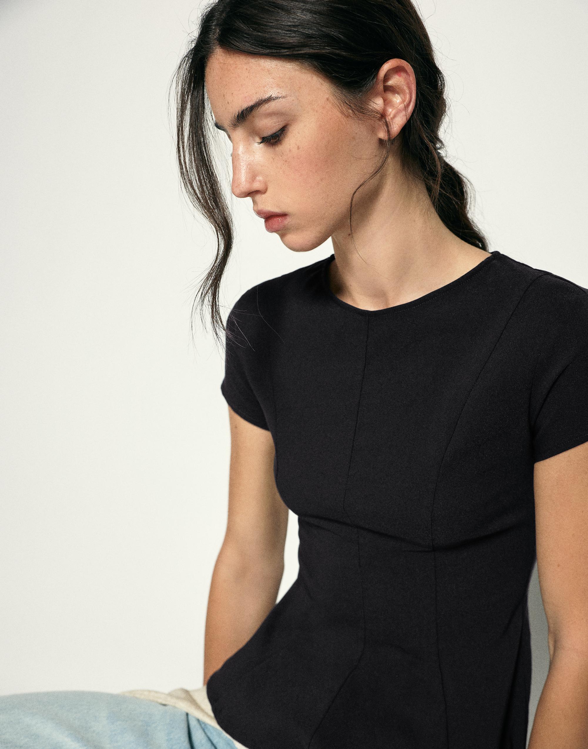 Peplum top — Black