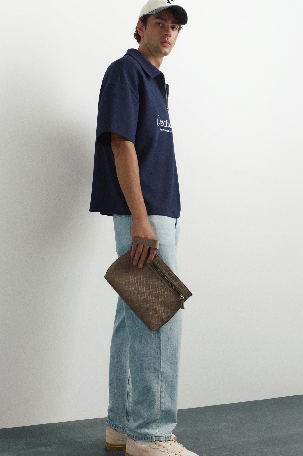 Embossed handle clutch bag — Brown