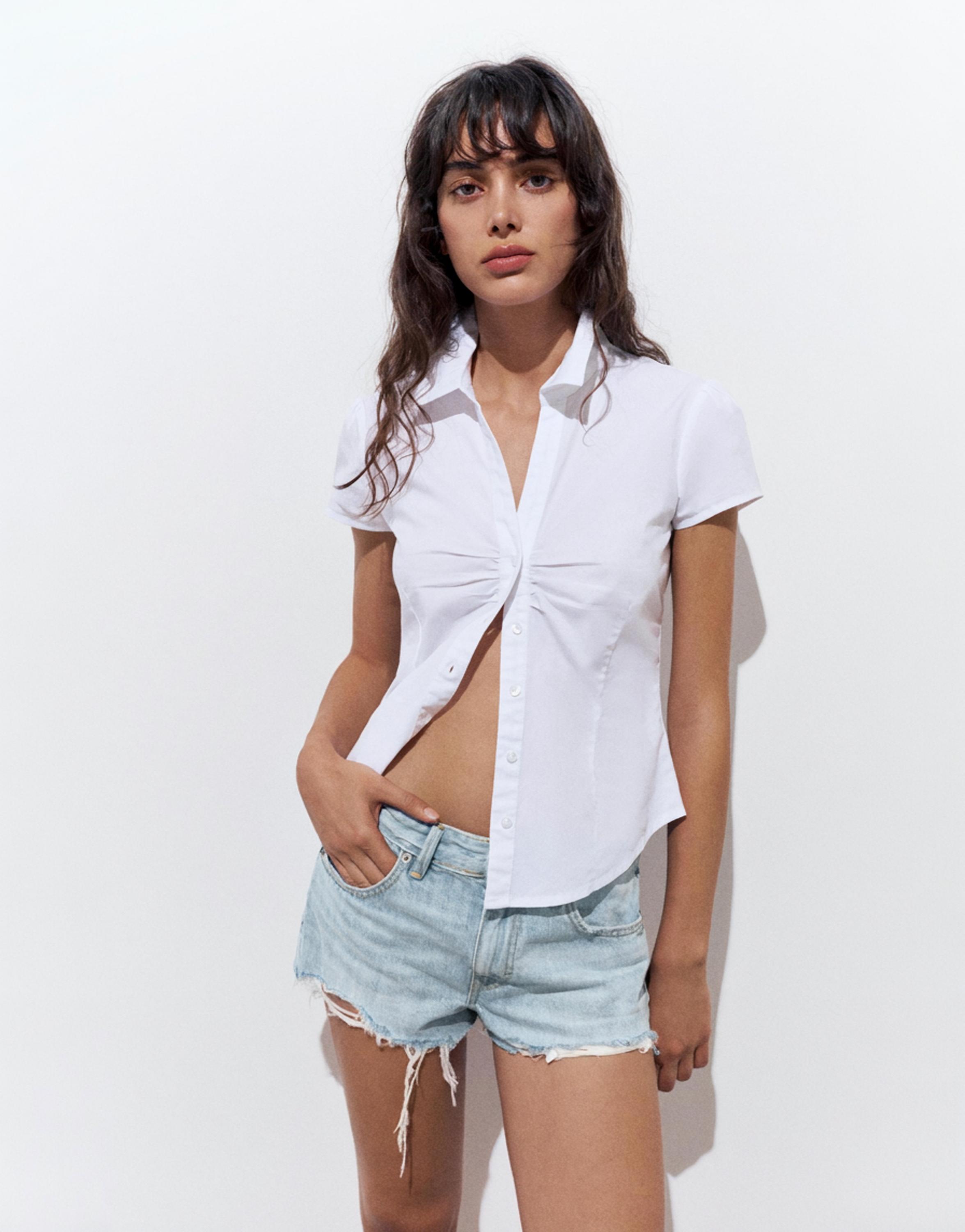 Mini ripped denim shorts — Pale blue