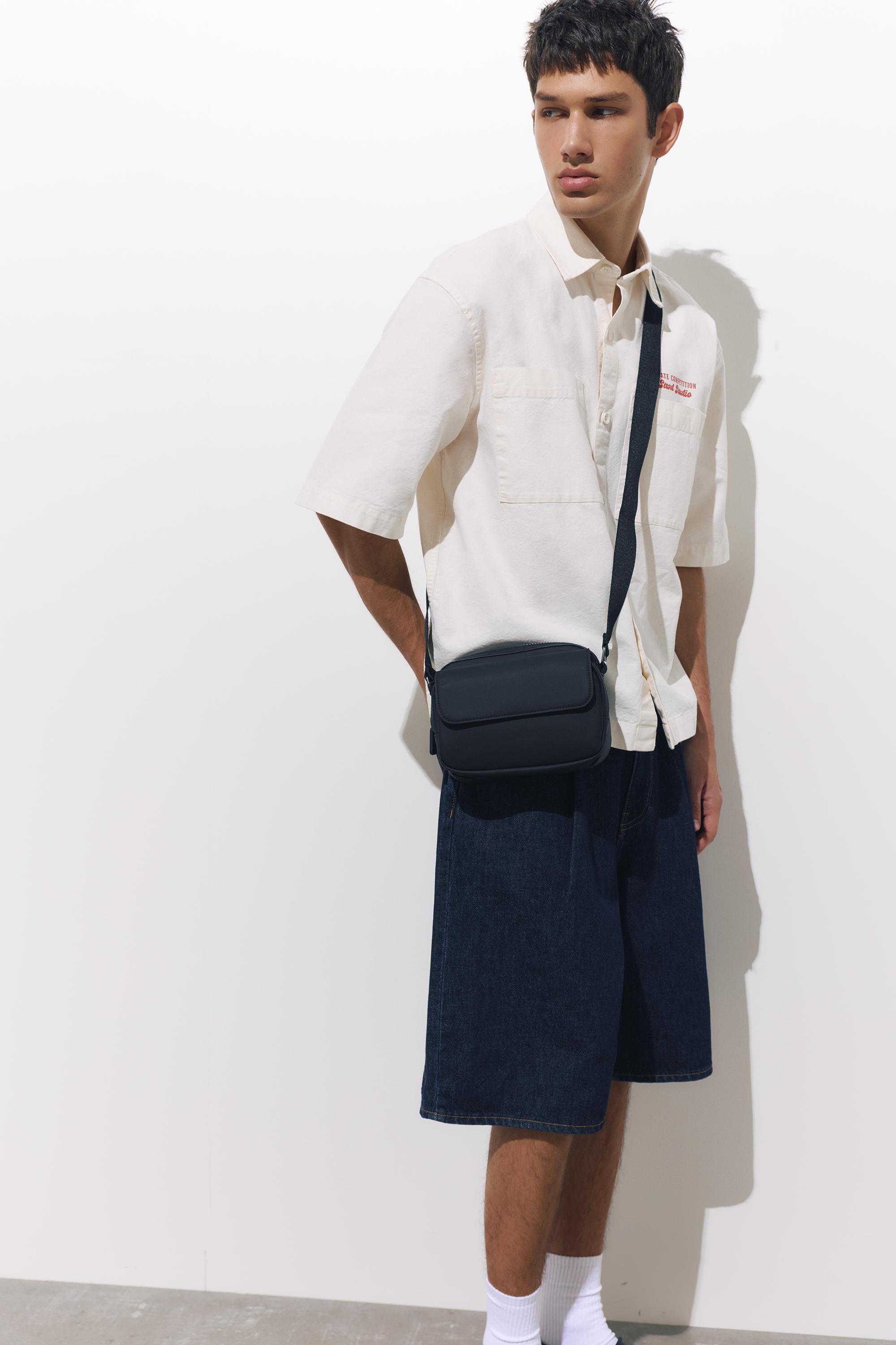 Rubberised crossbody bag — Black