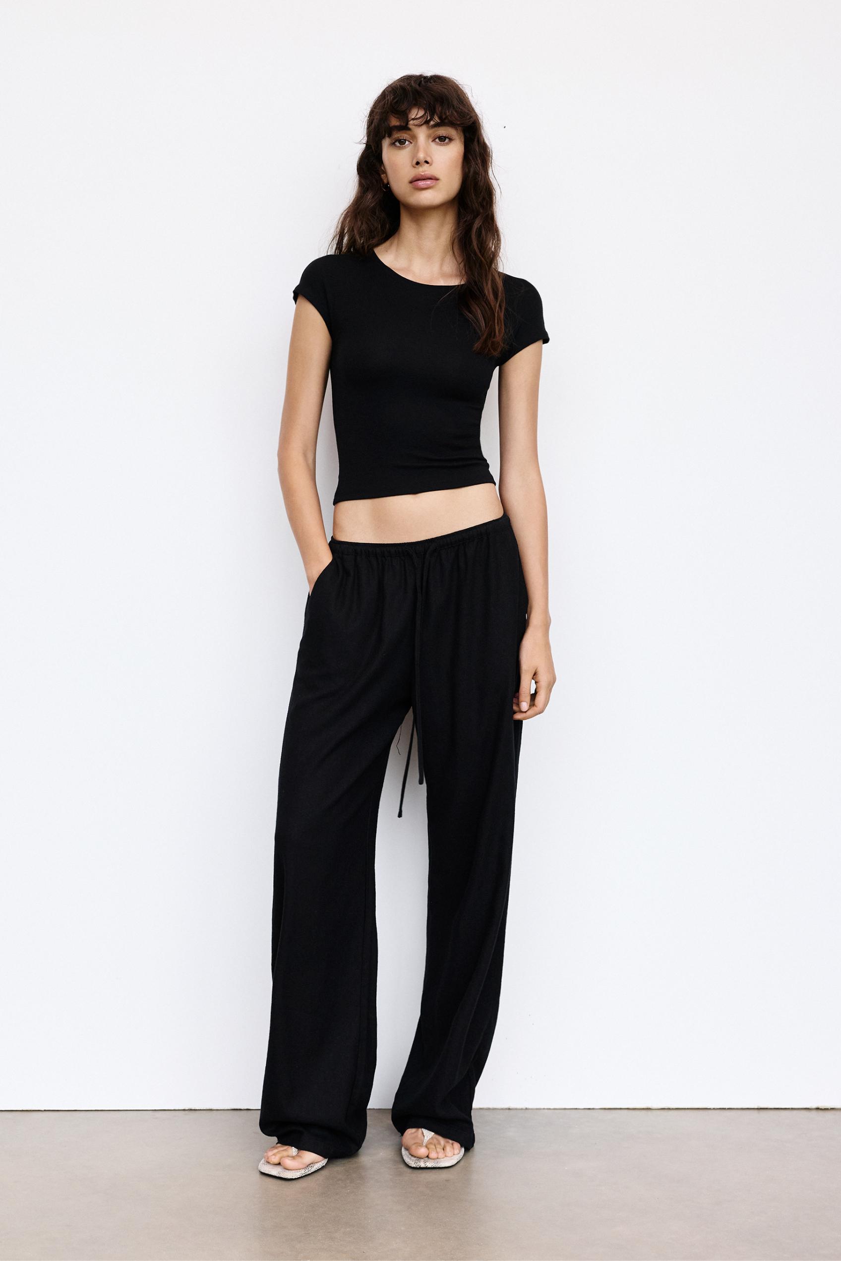 Flowy trousers with linen — Black