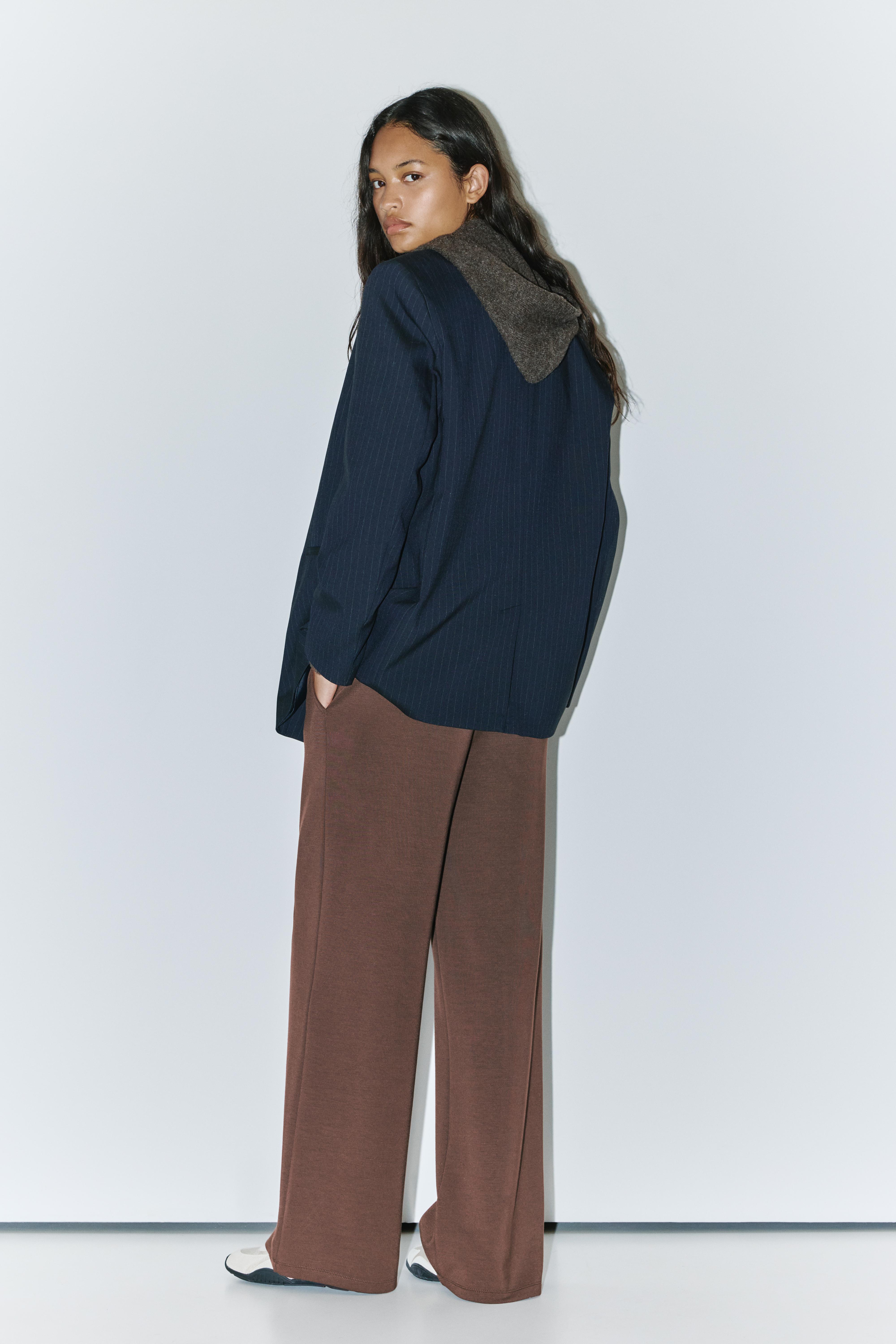Soft-touch wide-leg trousers — Brown