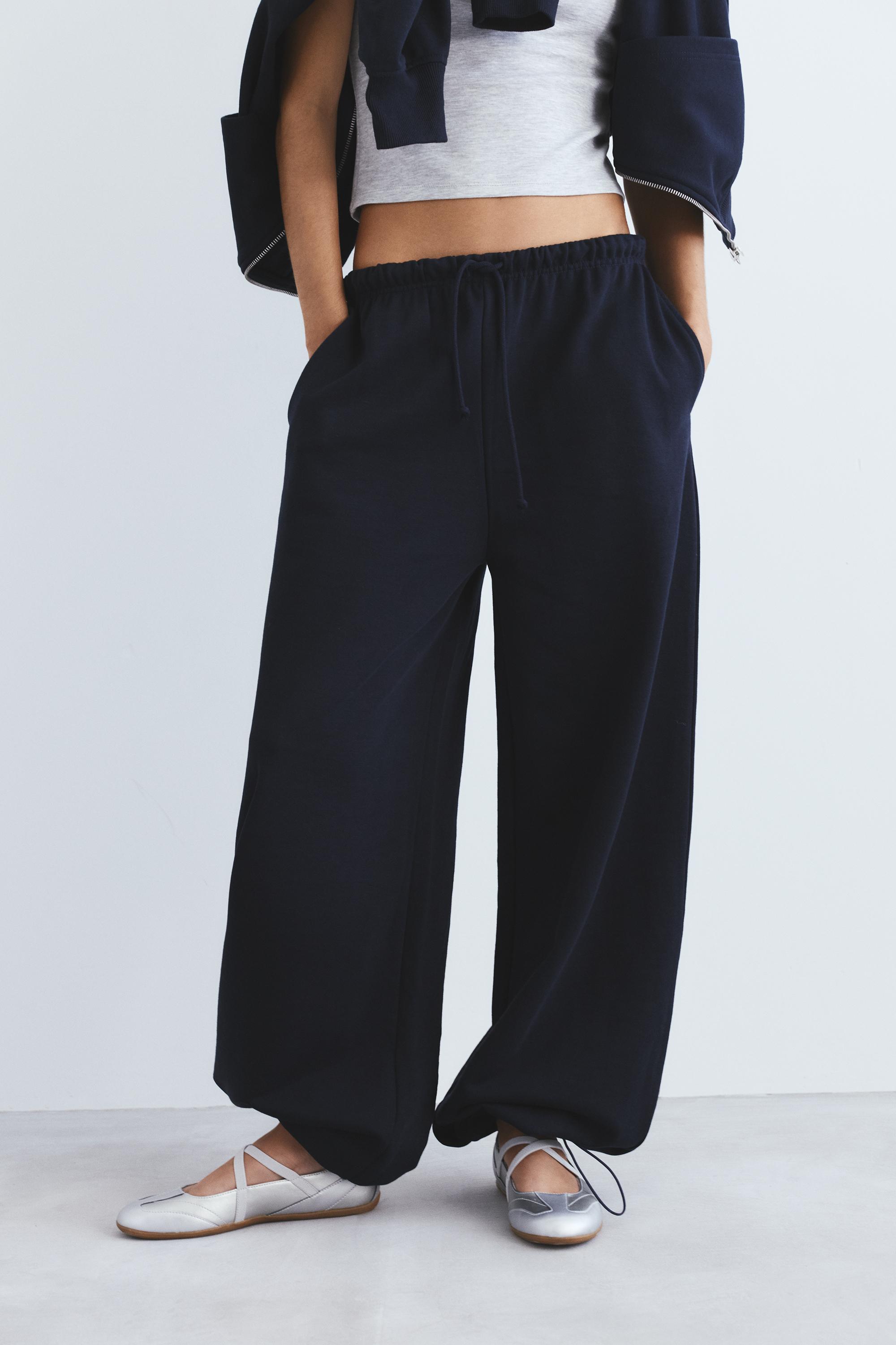 Wide-leg tracksuit bottoms with adjustable hem — Navy