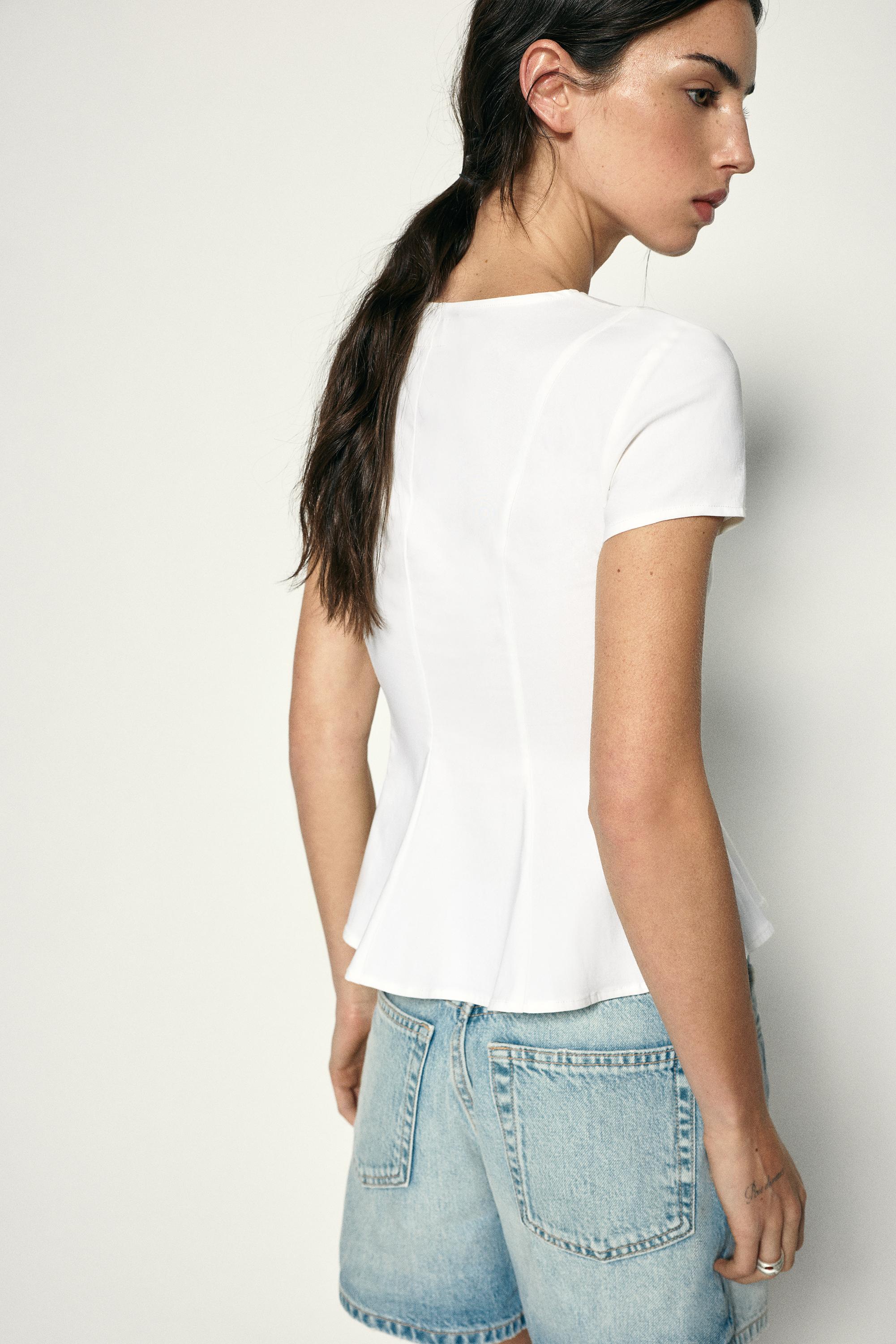 Peplum top — White