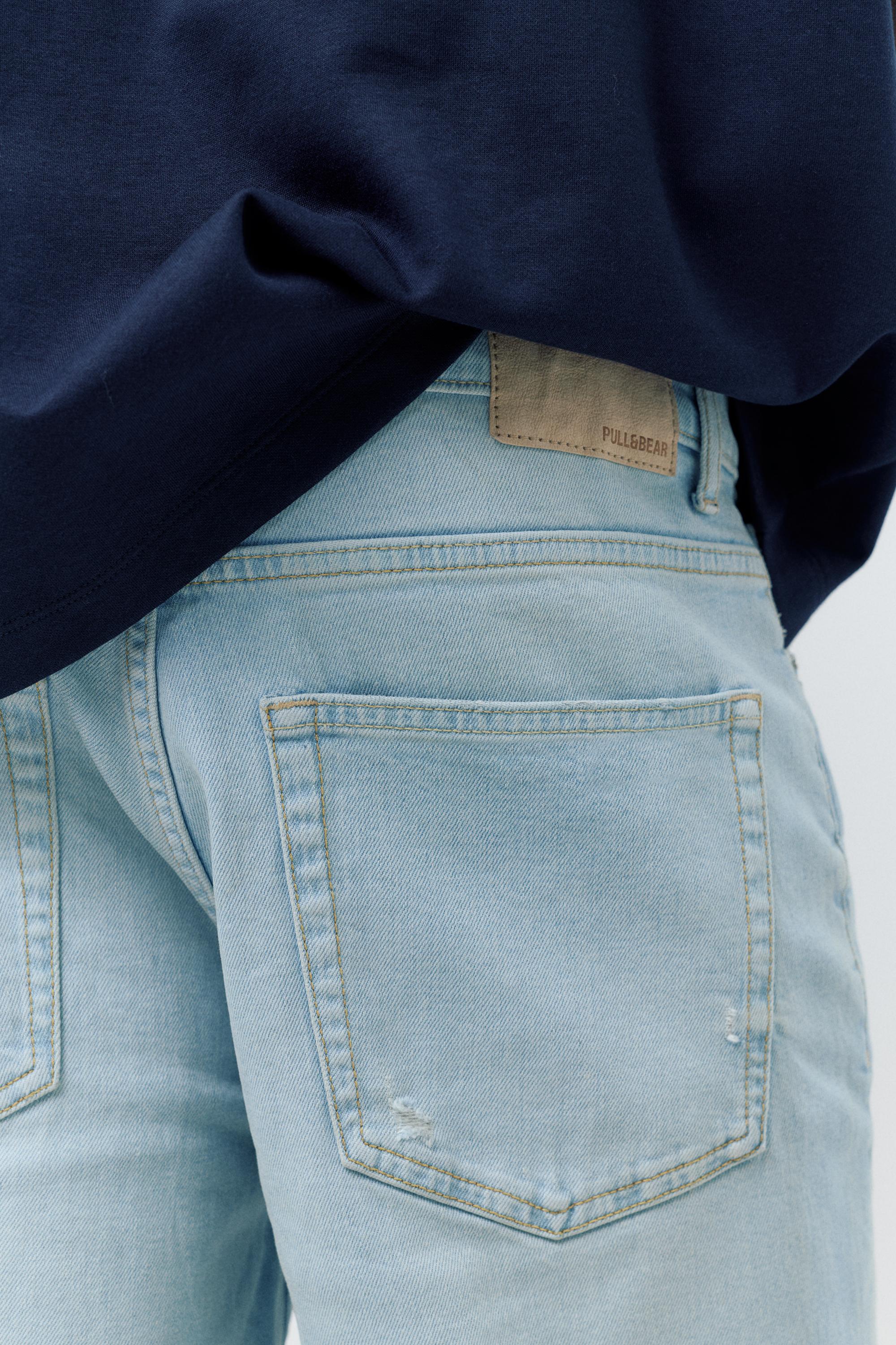 Ripped denim Bermuda shorts — Pale indigo