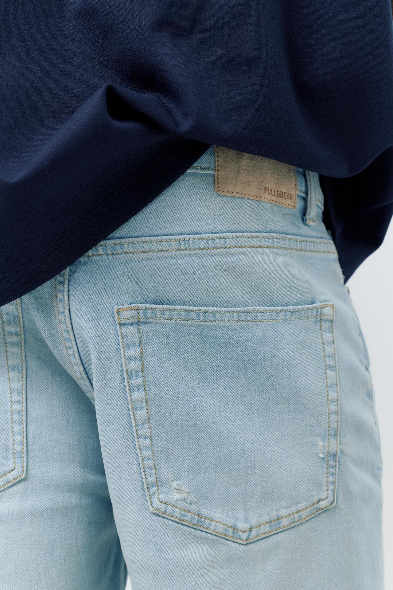 Ripped denim Bermuda shorts — Pale indigo