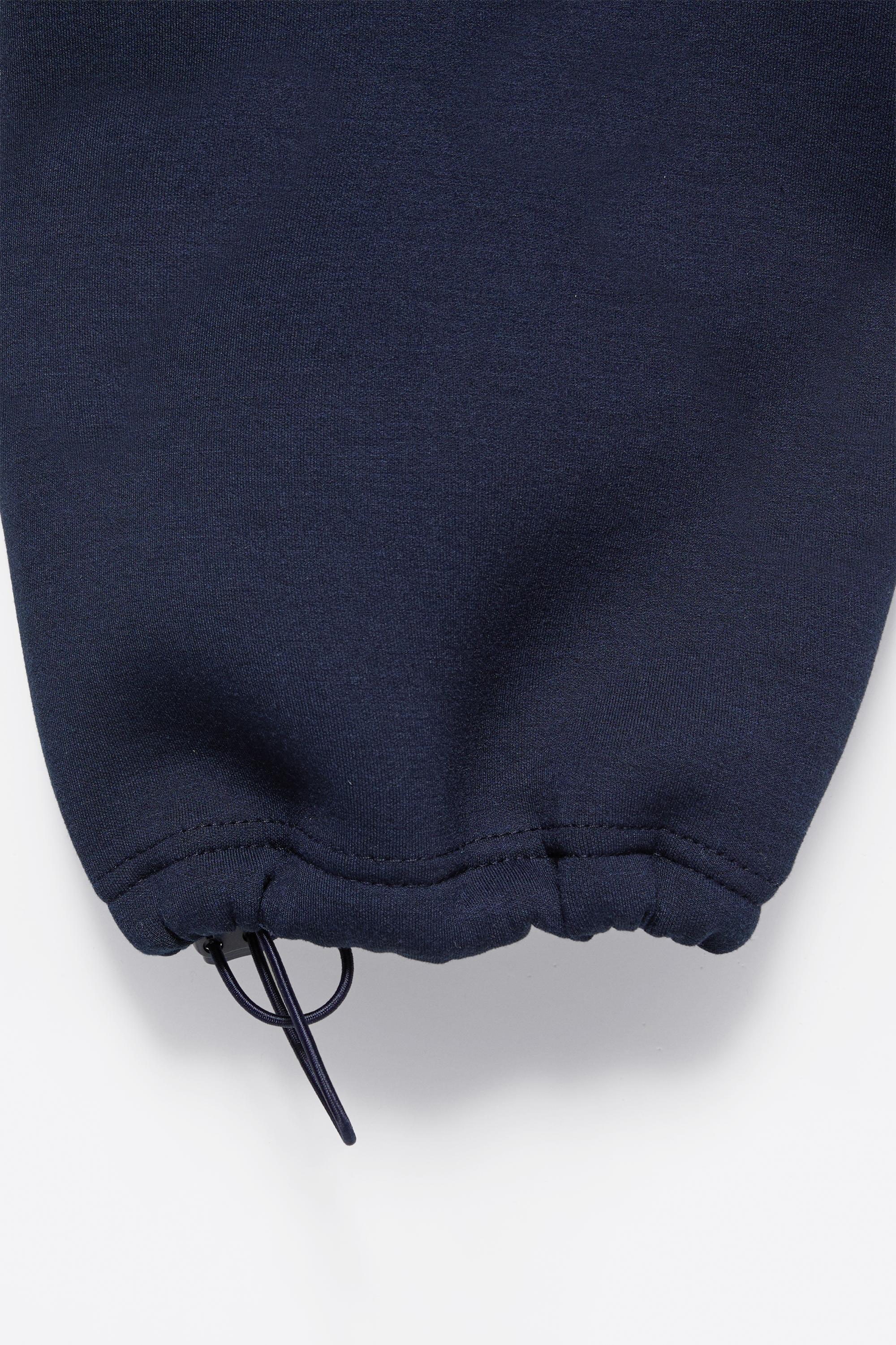 Neoprene-effect baggy trousers — Navy