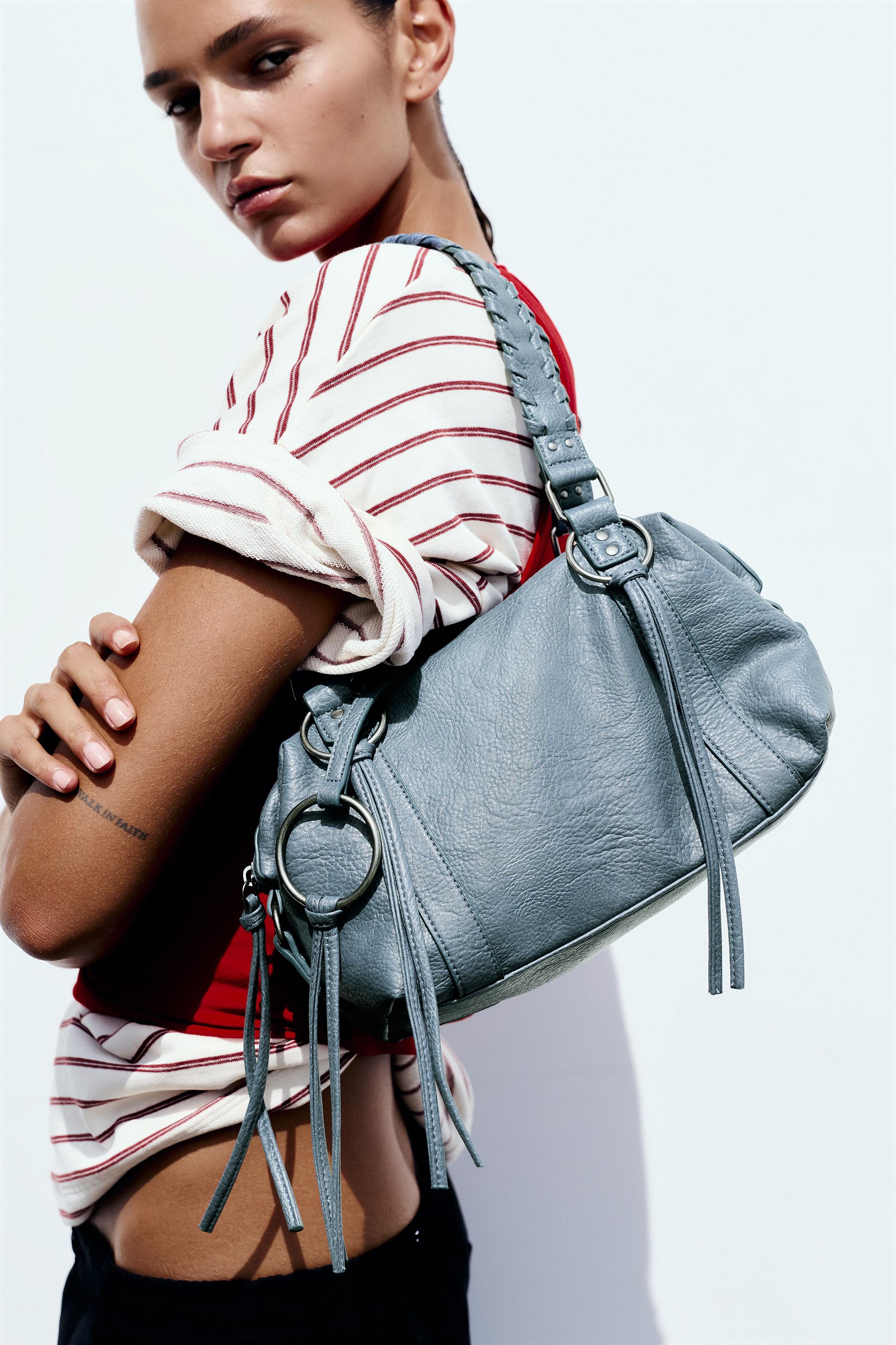 Borsa a spalla con anelli