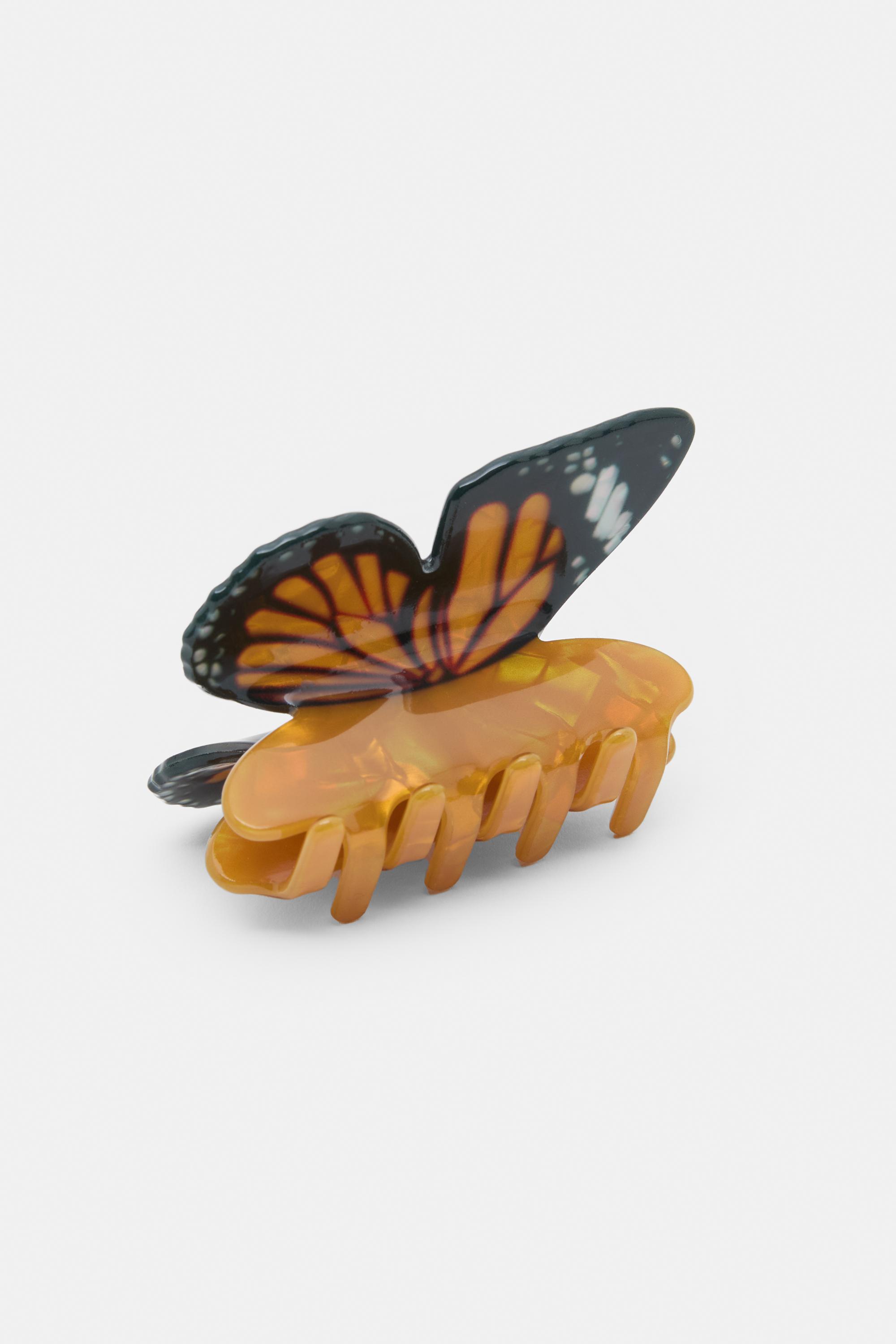 Kelebek kürk tokası