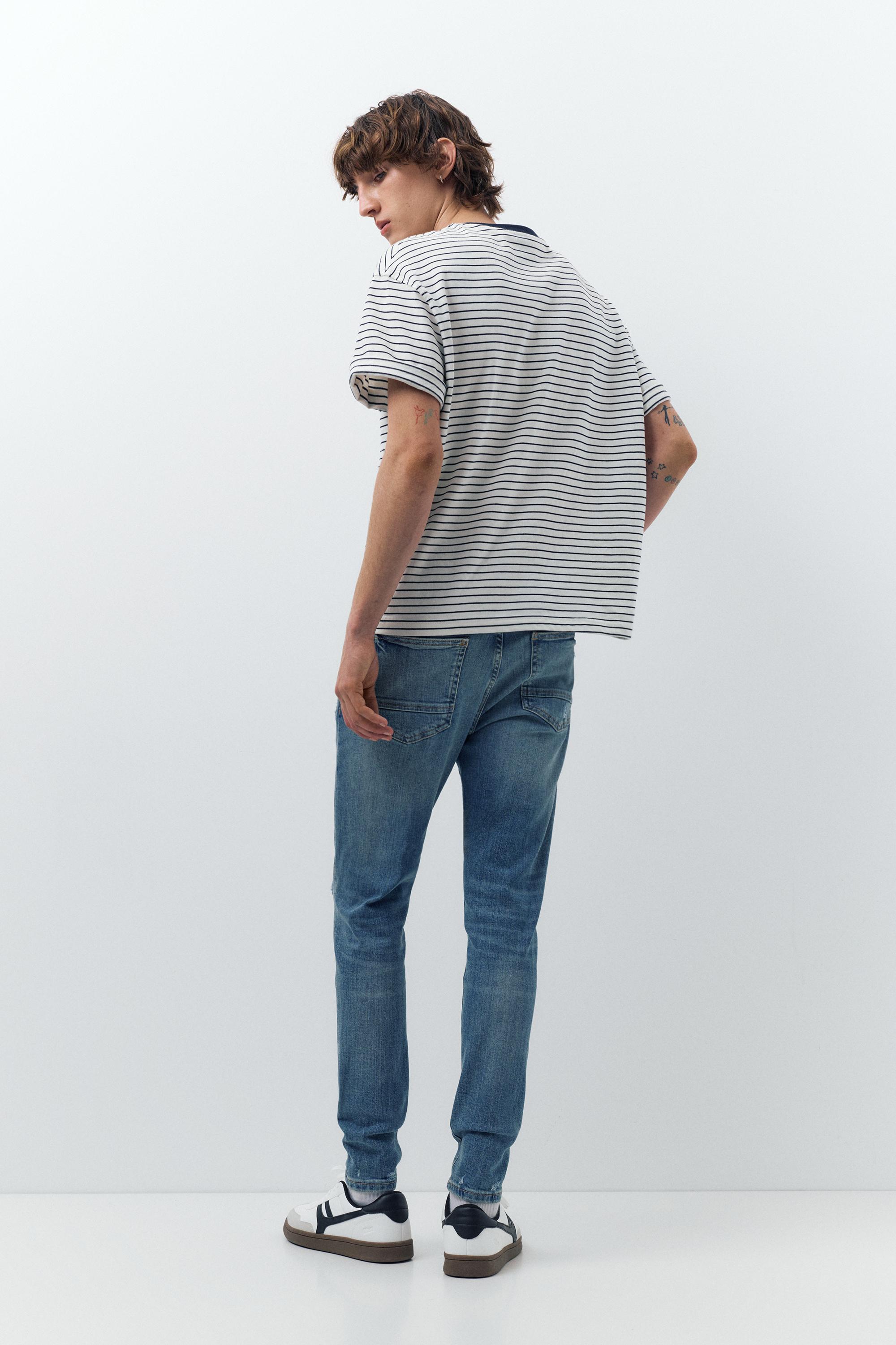 Ripped skinny jeans — Medium blue