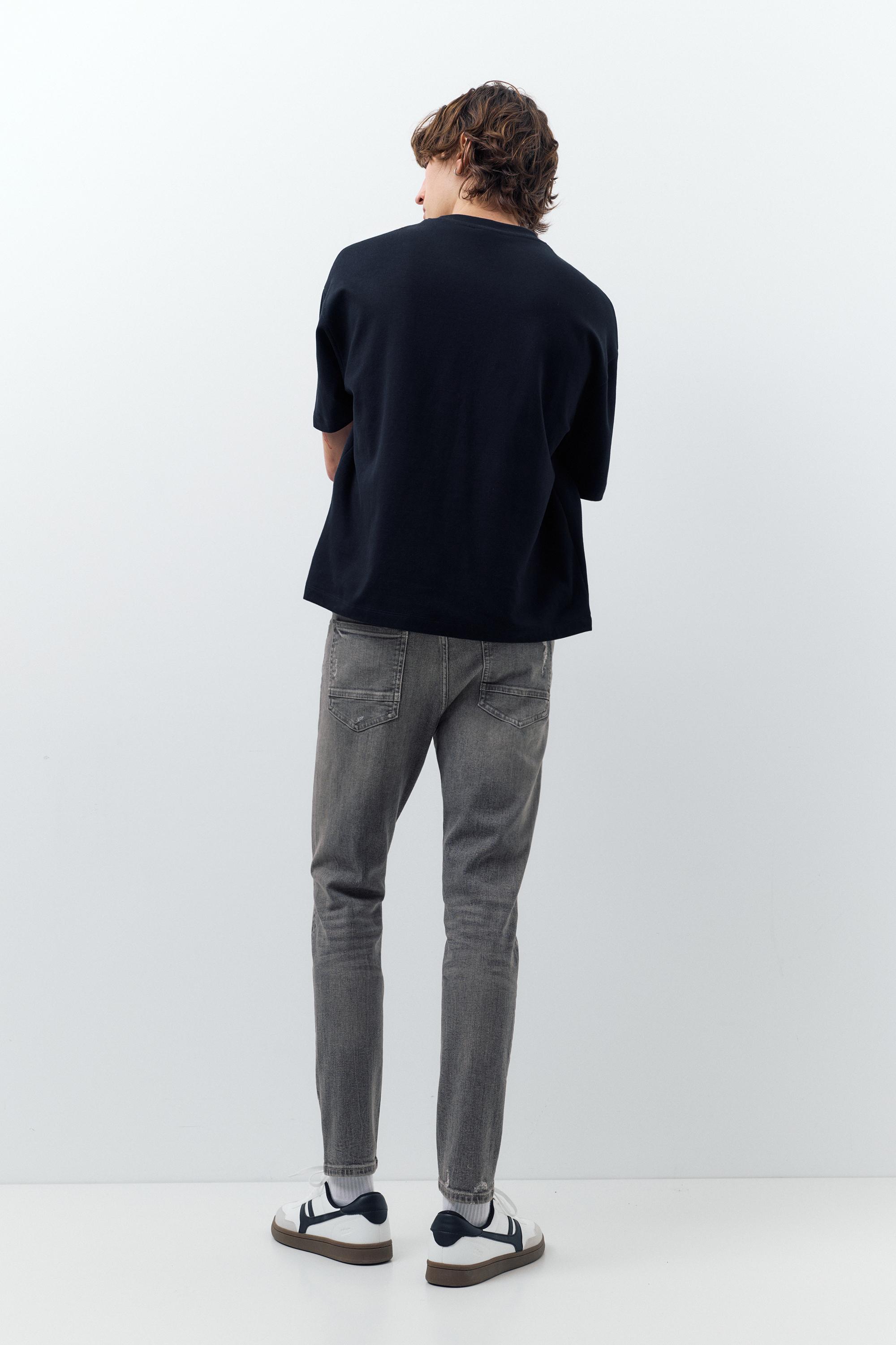 Ripped skinny jeans — Dark grey