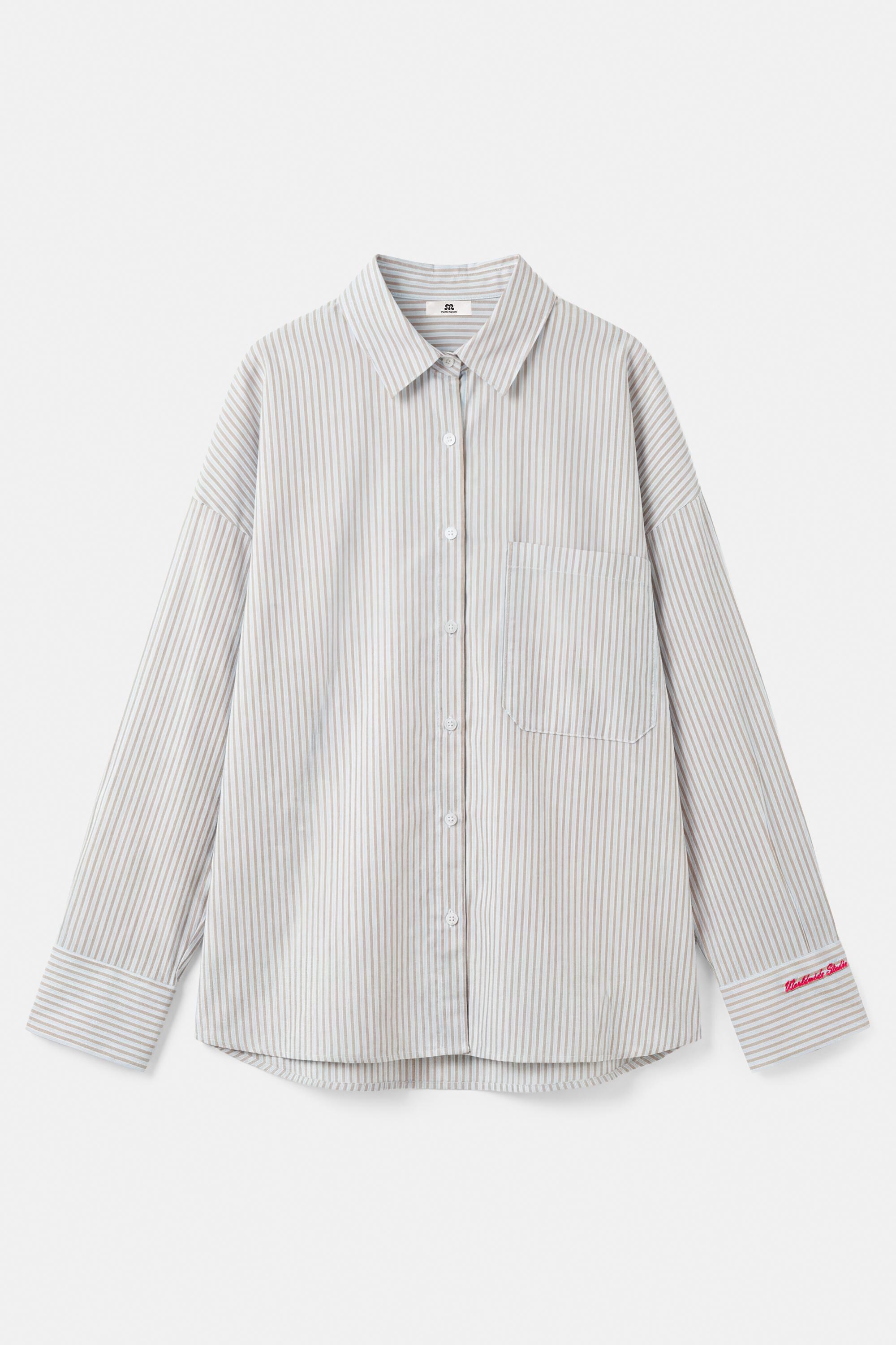 Embroidered striped shirt — Pastel blue