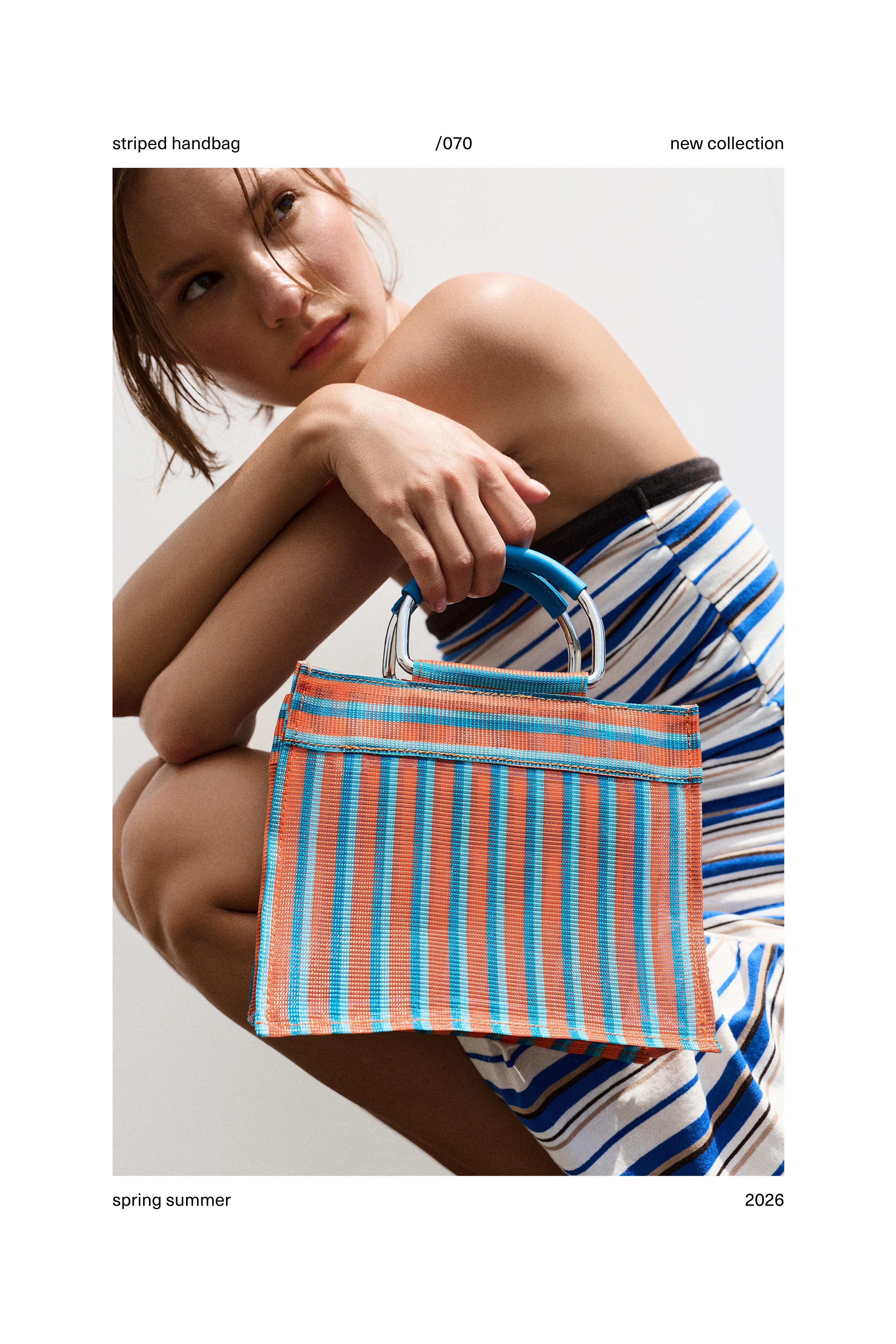 Striped handbag — Orange