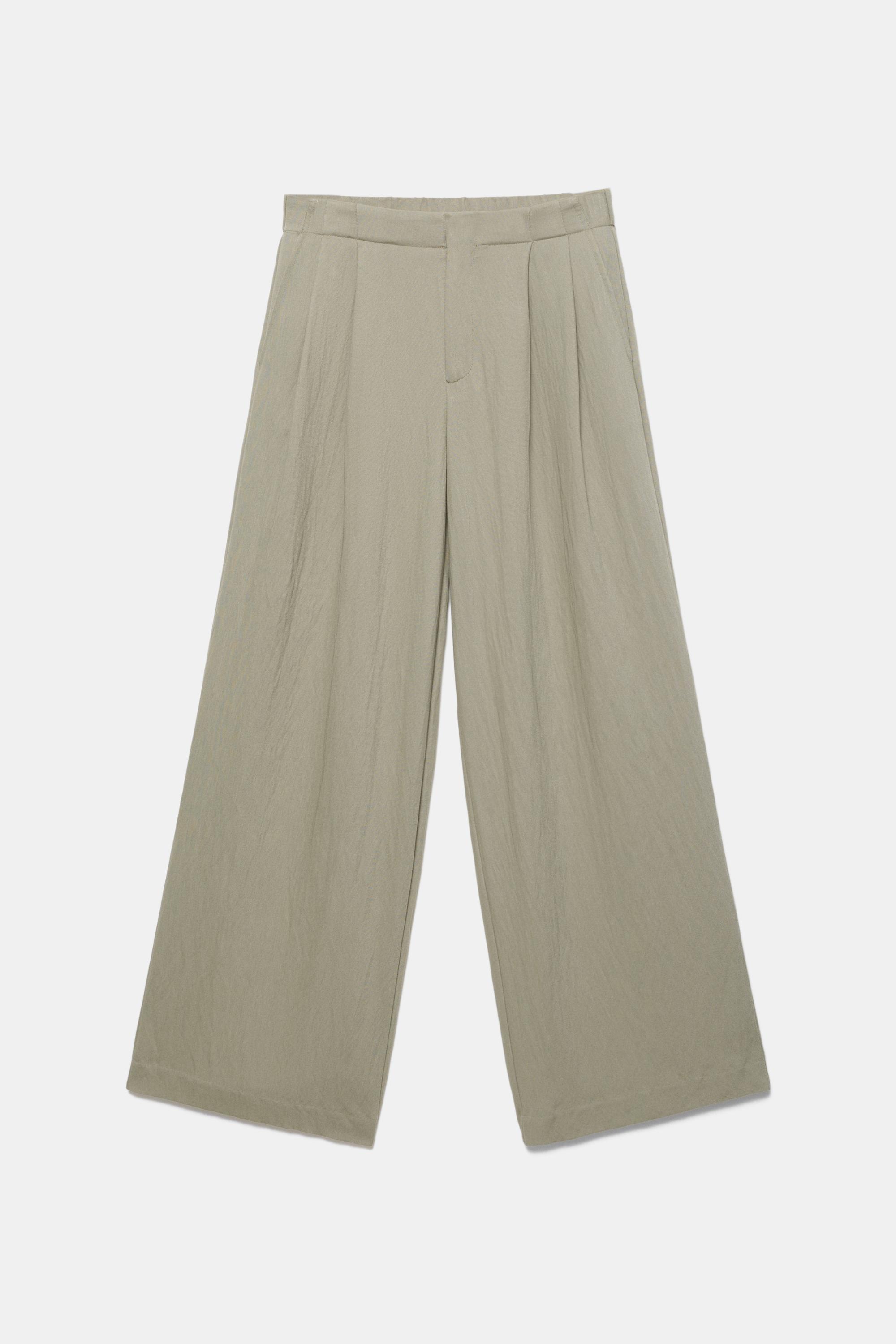 Düğmeli ve fermuarlı, kemer tokalı, önü pensli, elastik belli, tailored fit pantolon. - Görsel 34