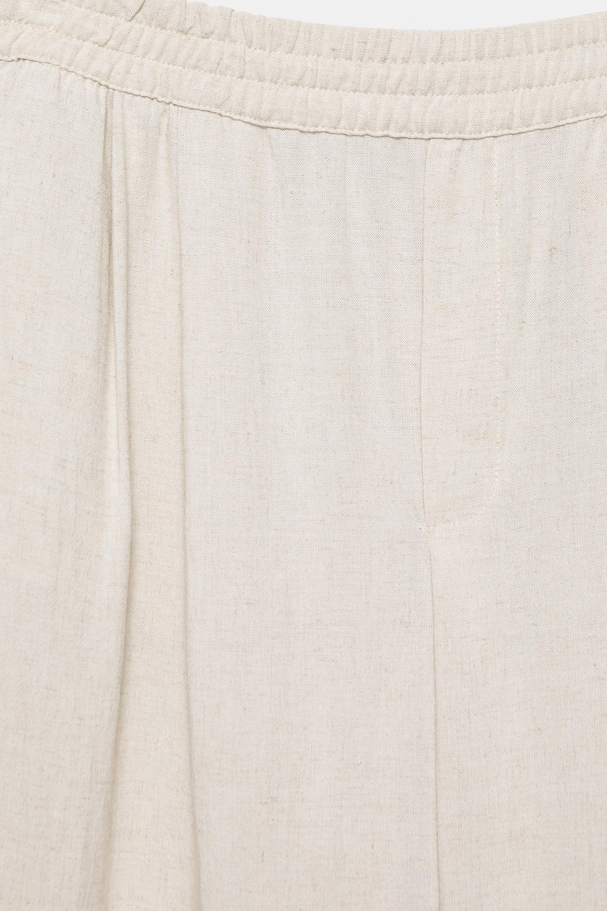 Flowing darted trousers — Sand