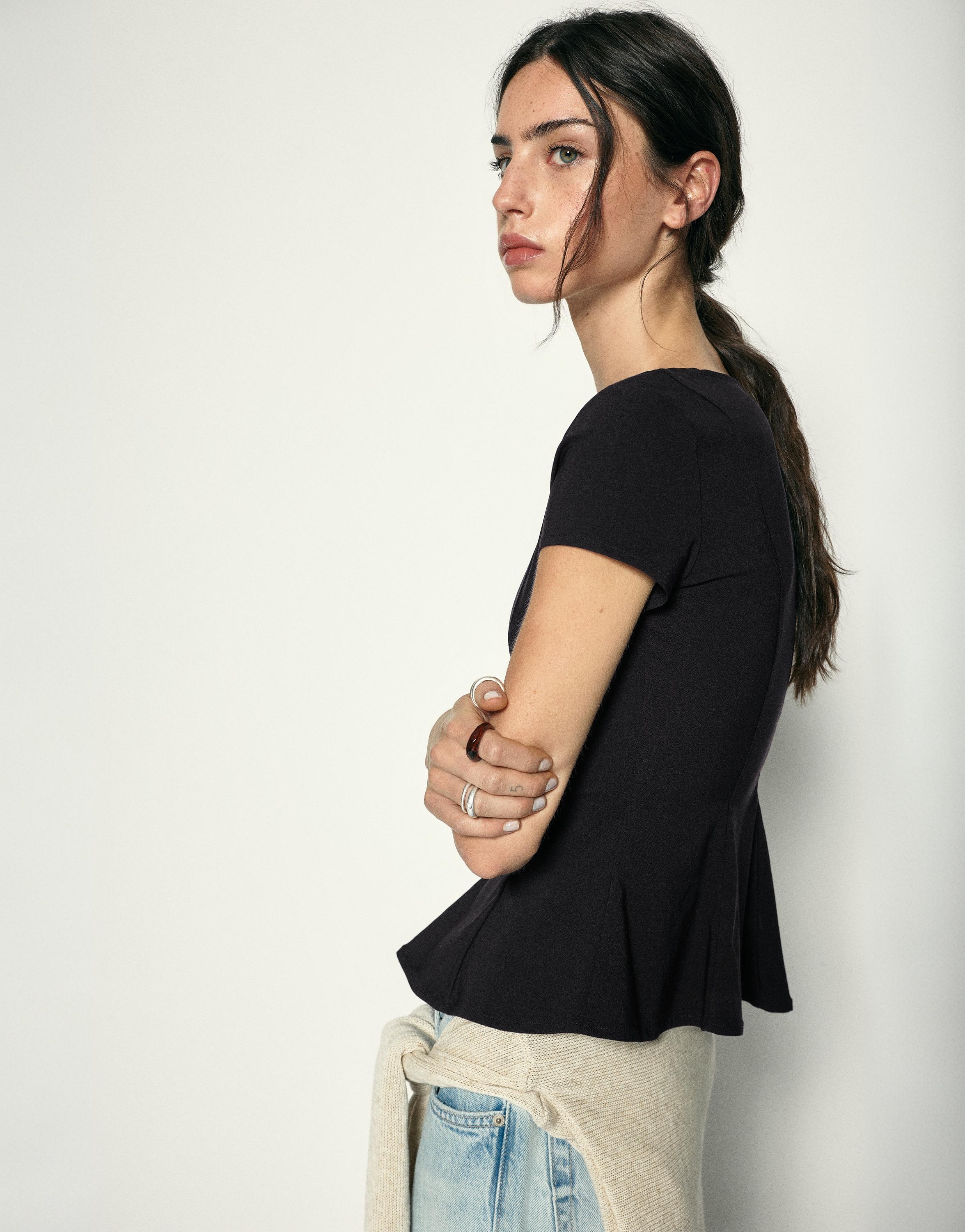 Peplum top — Black