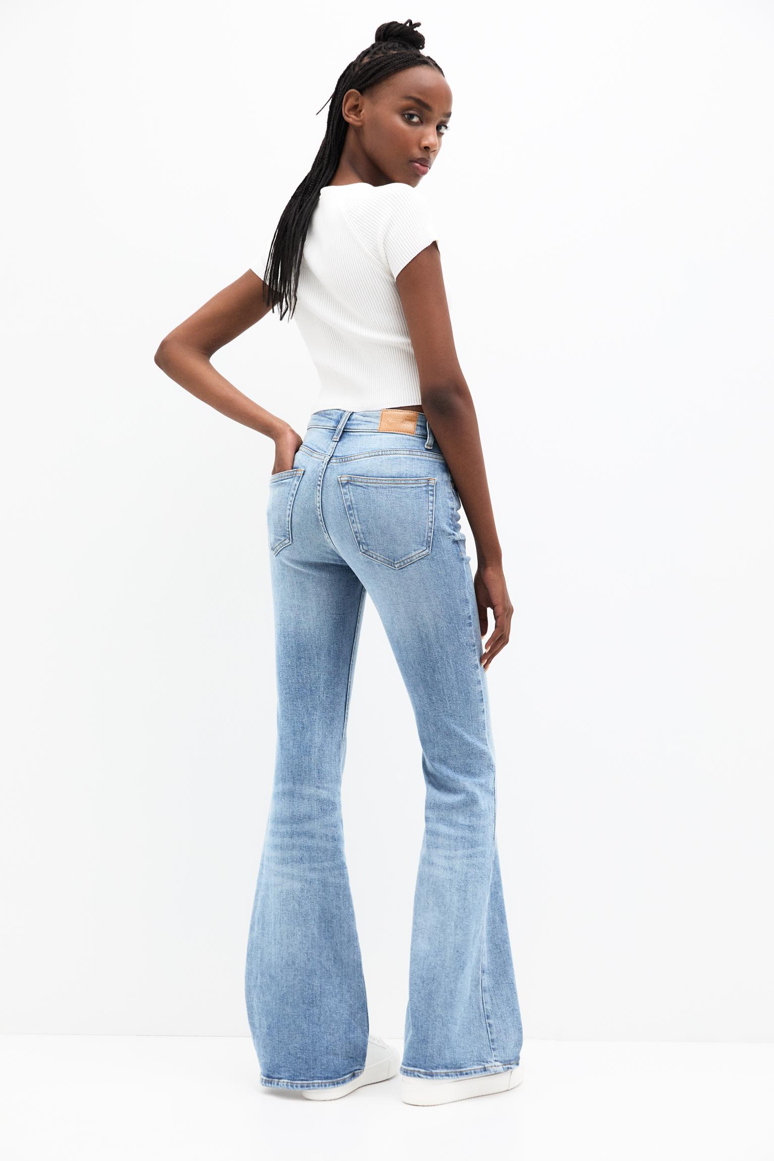 Pantalon évasé taille haute femme sale