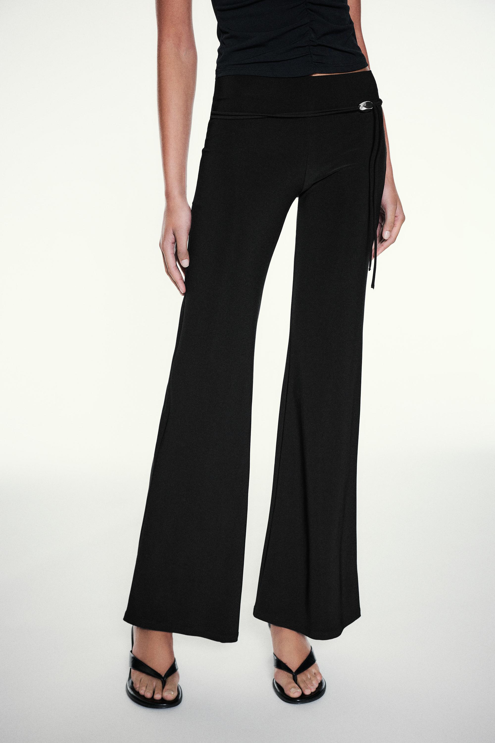 Black flared trousers — Black