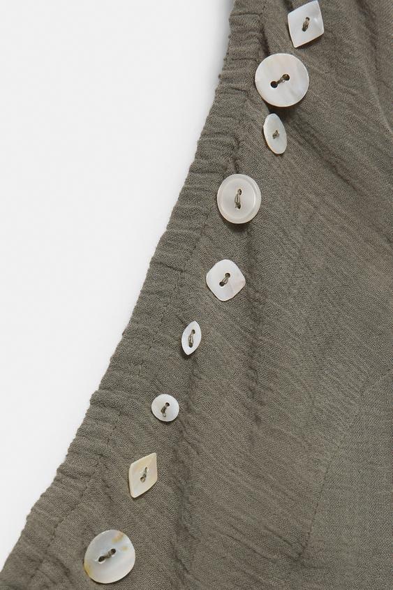 Halter yaka düğmeli top