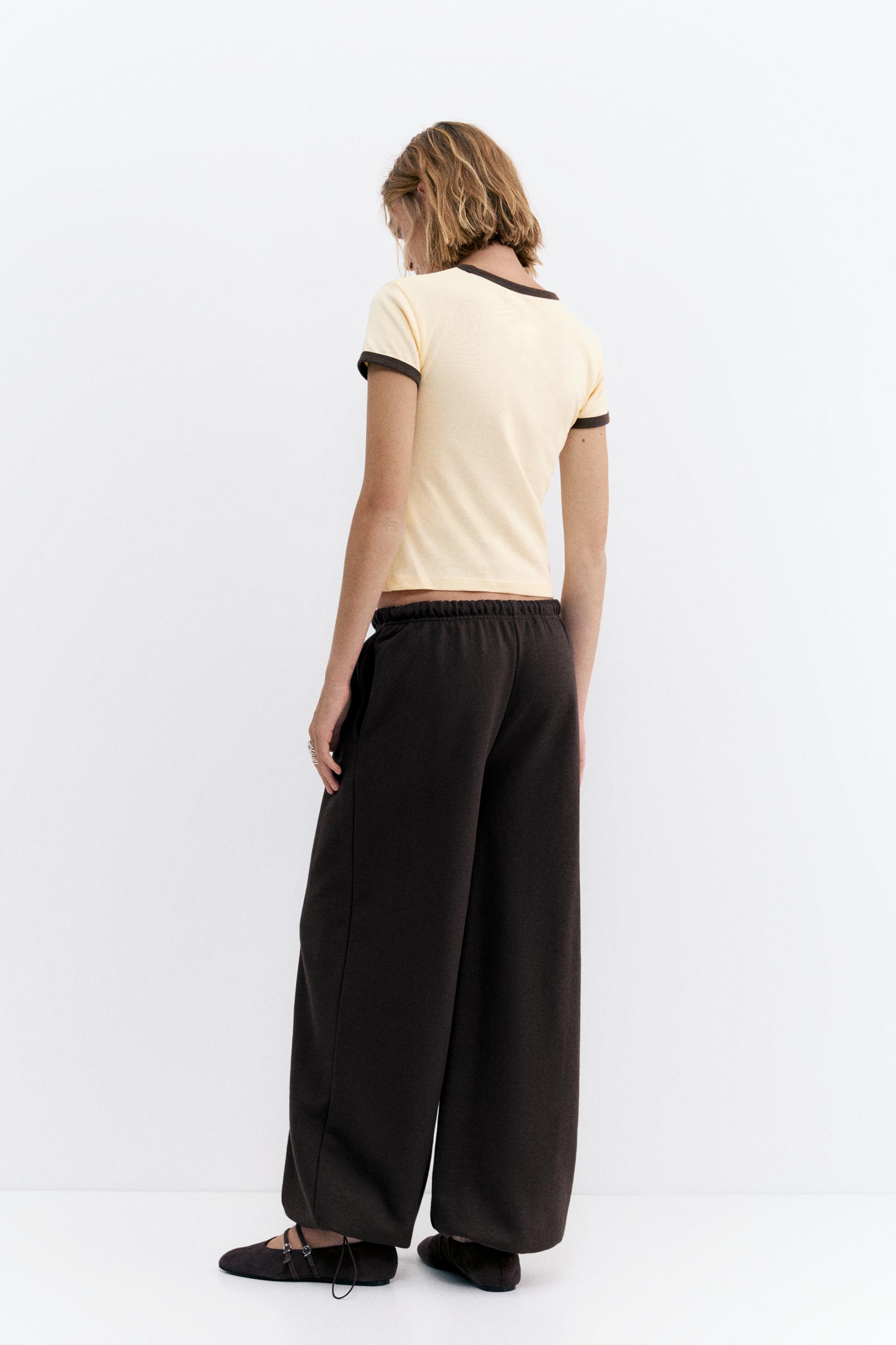 Wide-leg tracksuit bottoms with adjustable hem — Brown