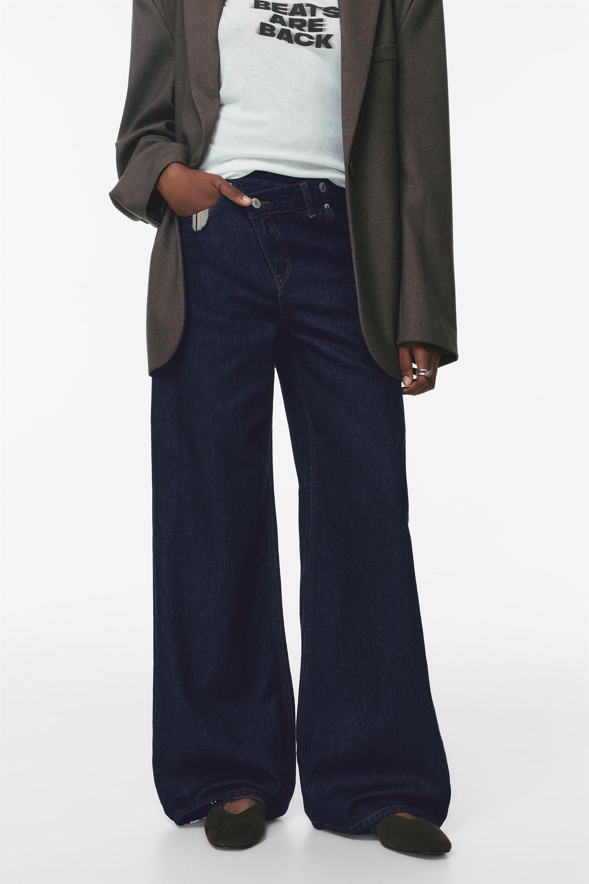 Çapraz kemerli geniş paça jean - Görsel 54