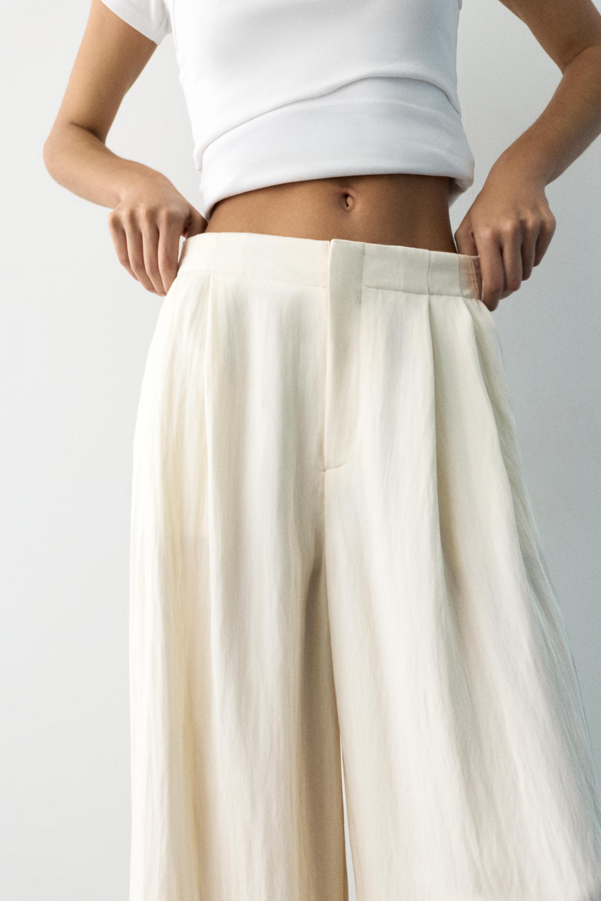 Düğmeli ve fermuarlı, kemer tokalı, önü pensli, elastik belli, tailored fit pantolon. - Görsel 21