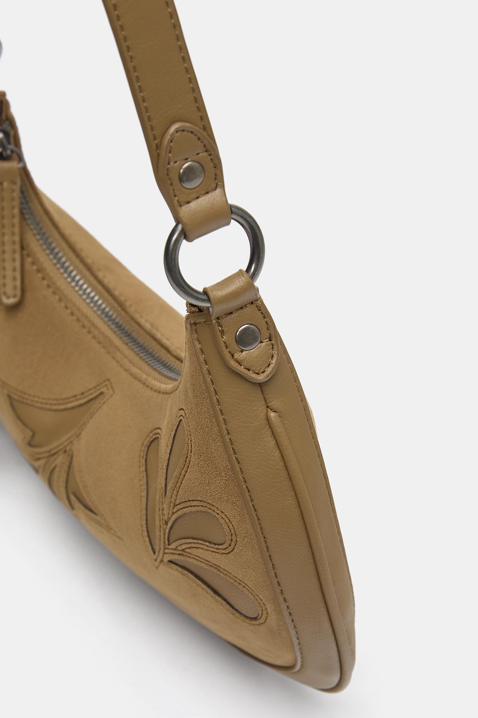 Embellished shoulder bag — Leather