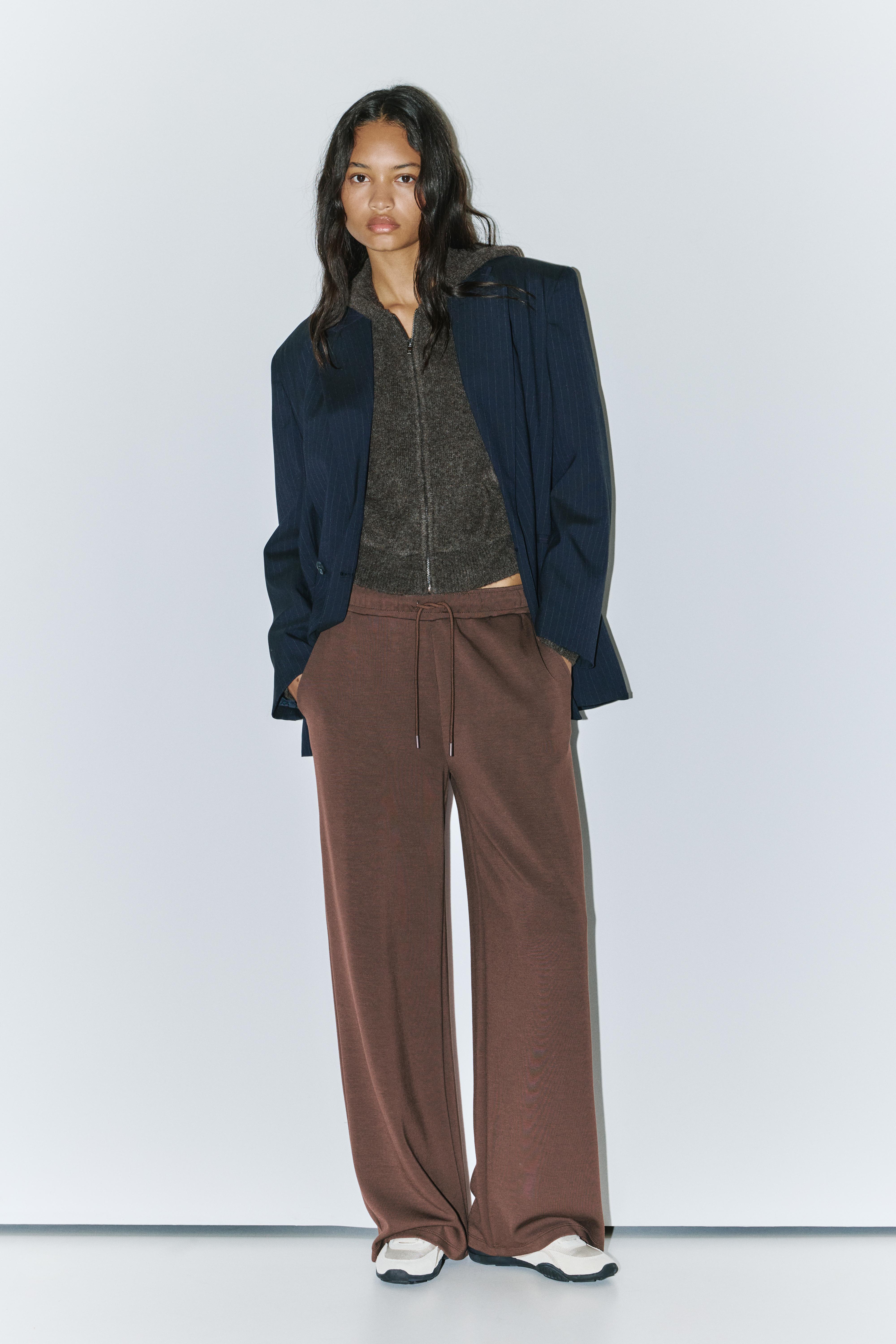 Soft-touch wide-leg trousers — Brown