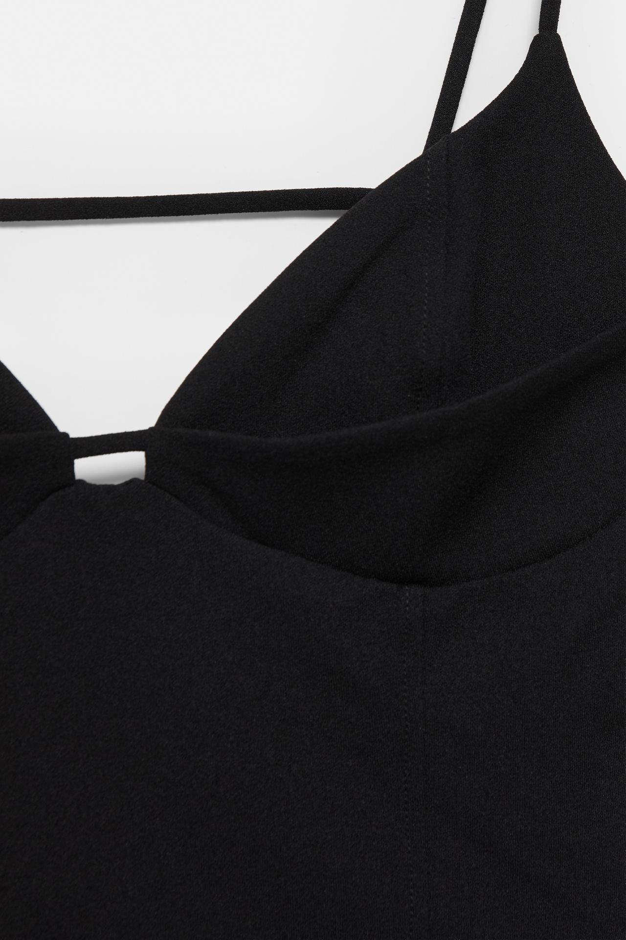 Strappy corsetry-inspired top — Black