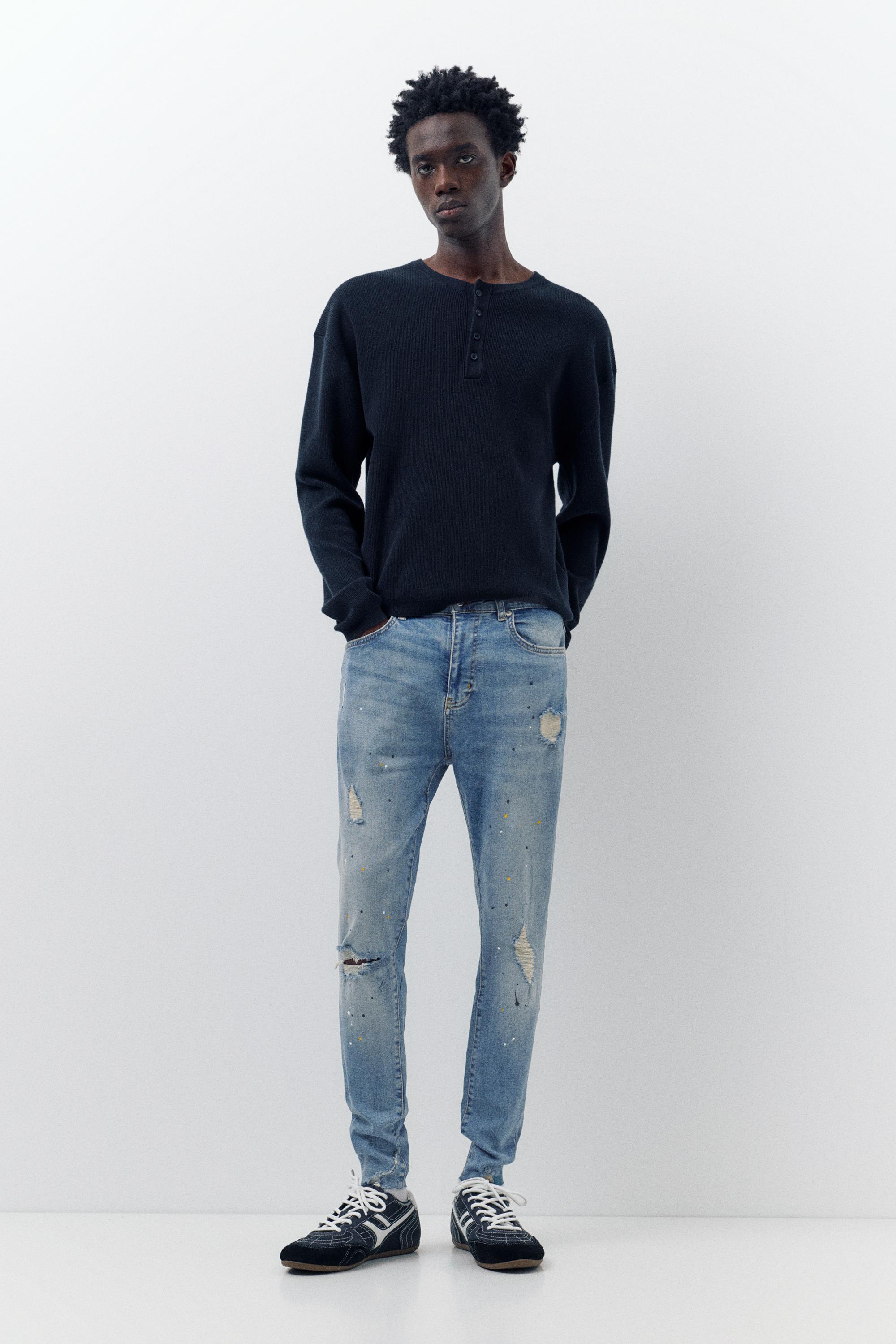 Paint splatter carrot-fit jeans — Medium blue