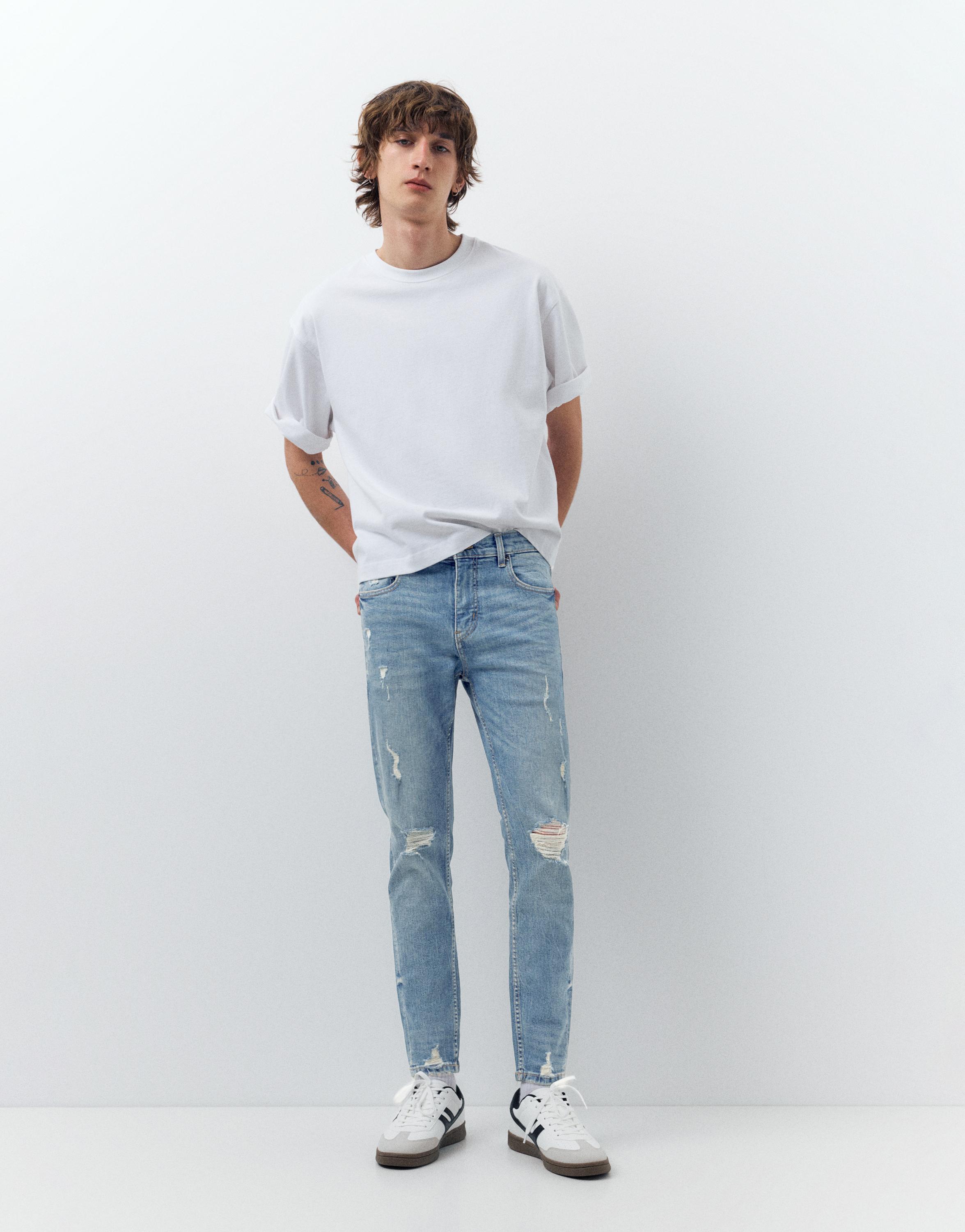 Ripped skinny jeans — Medium blue