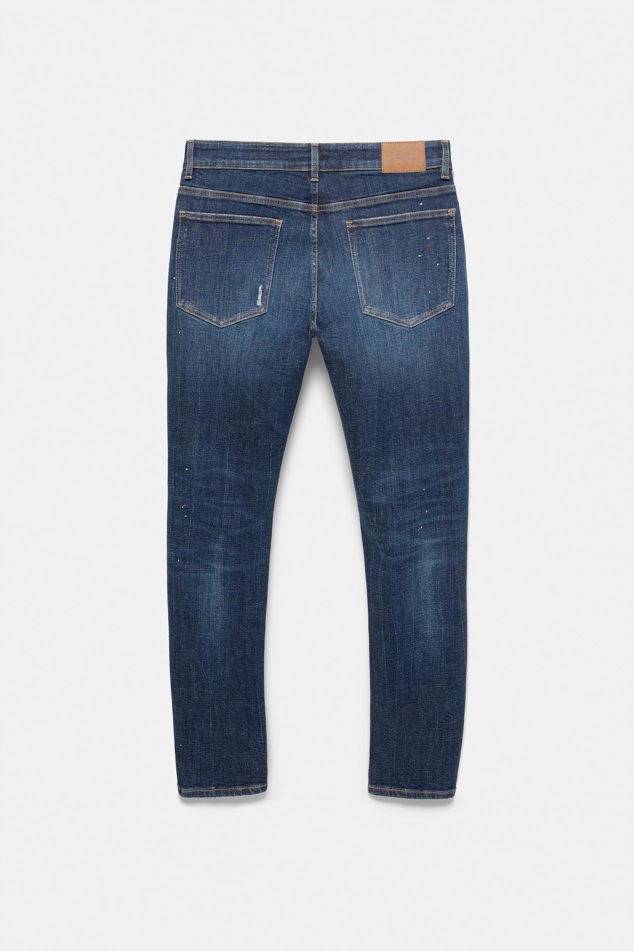 Paint splatter ripped skinny jeans — Medium blue