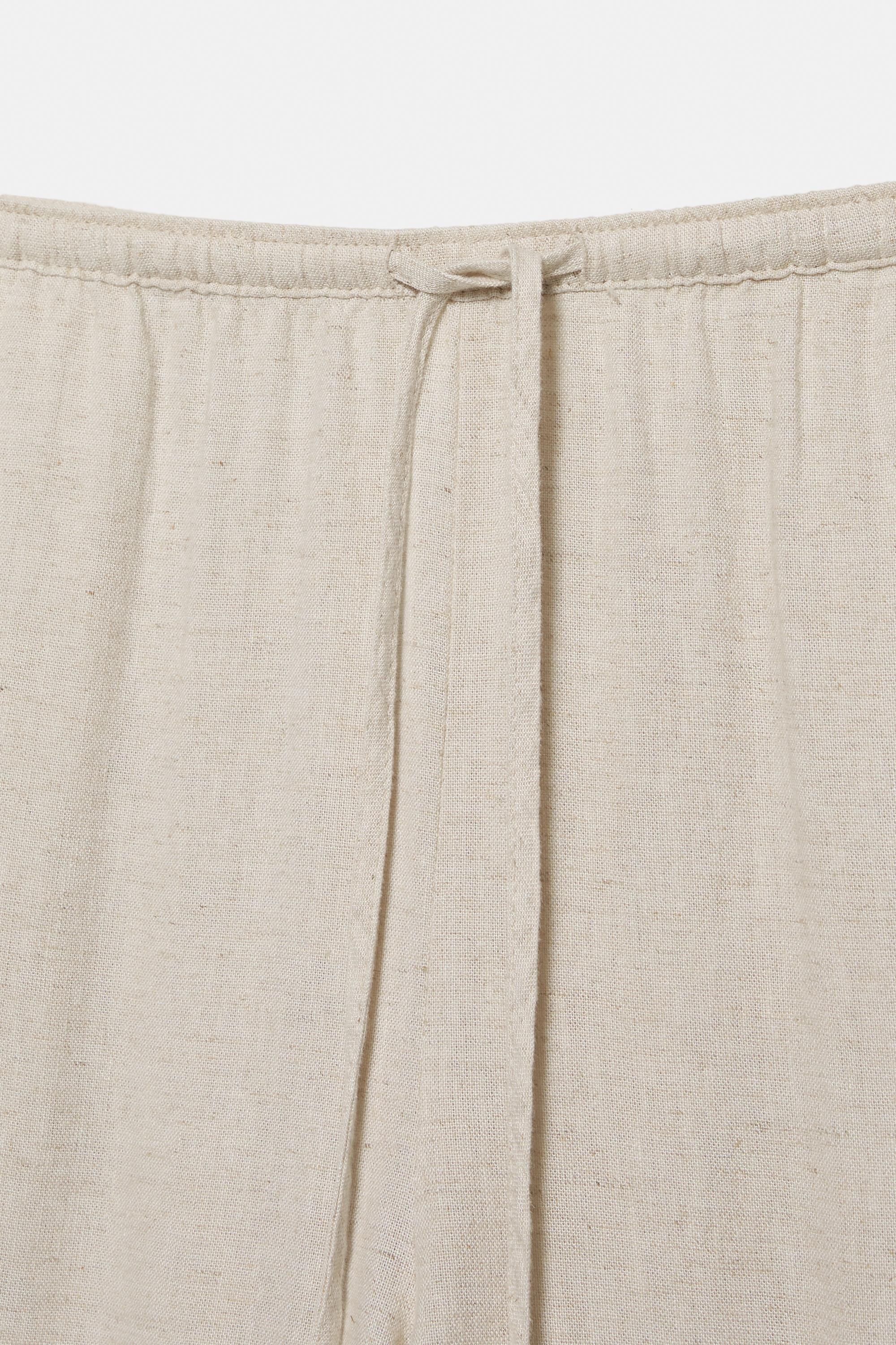 Flowy trousers with linen — Beige