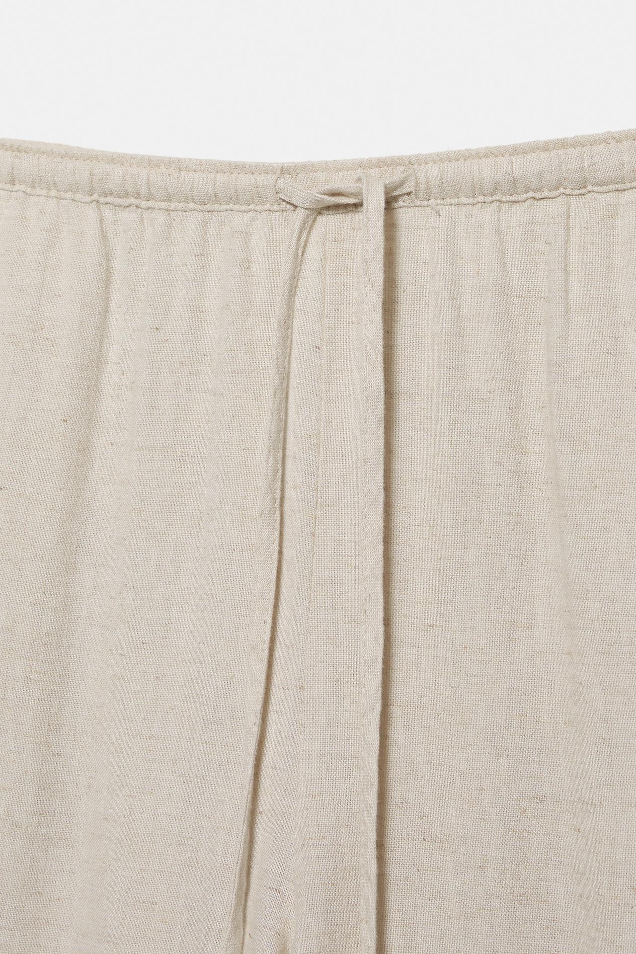 Flowy trousers with linen — Beige