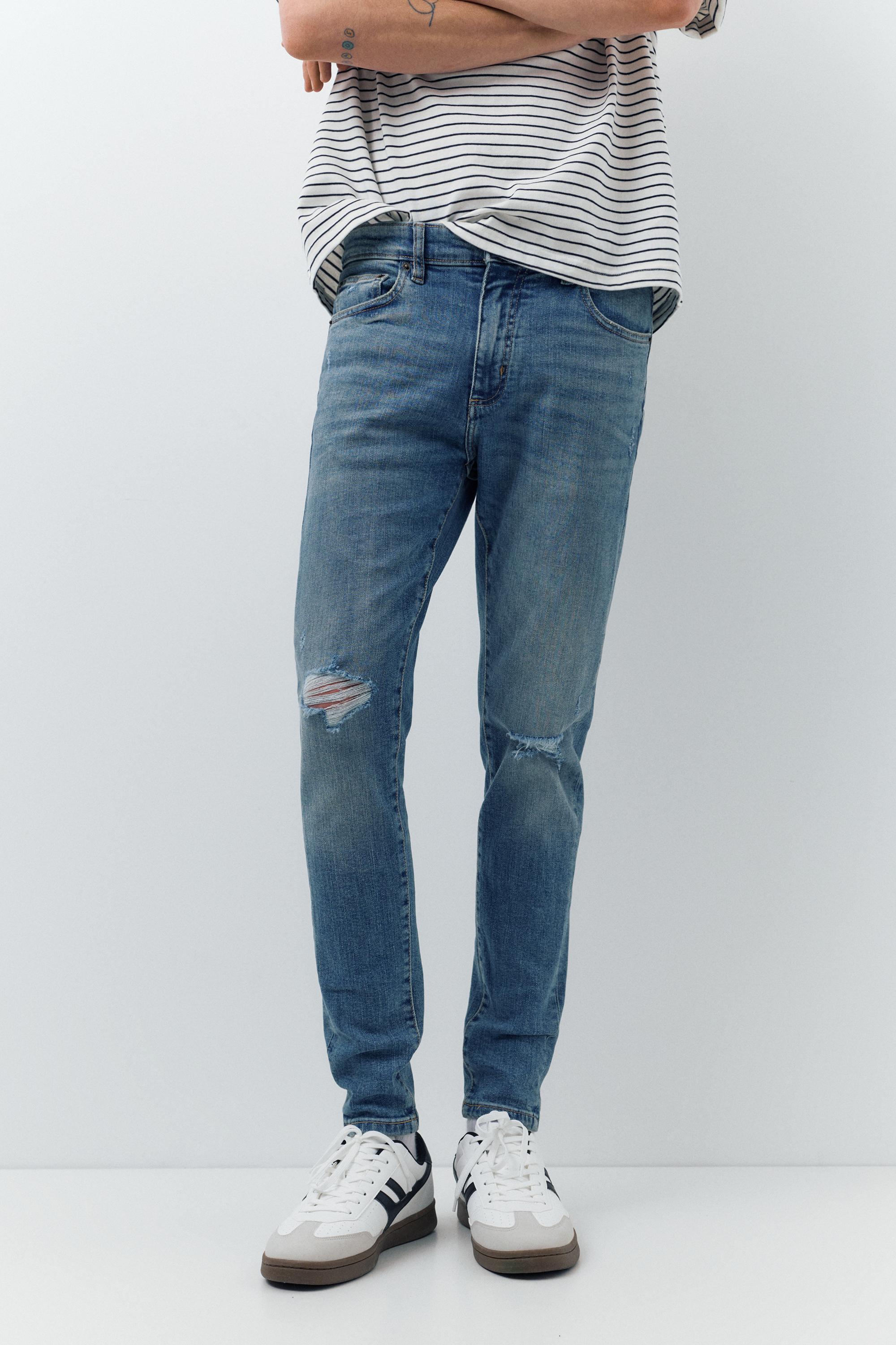 Ripped skinny jeans — Medium blue