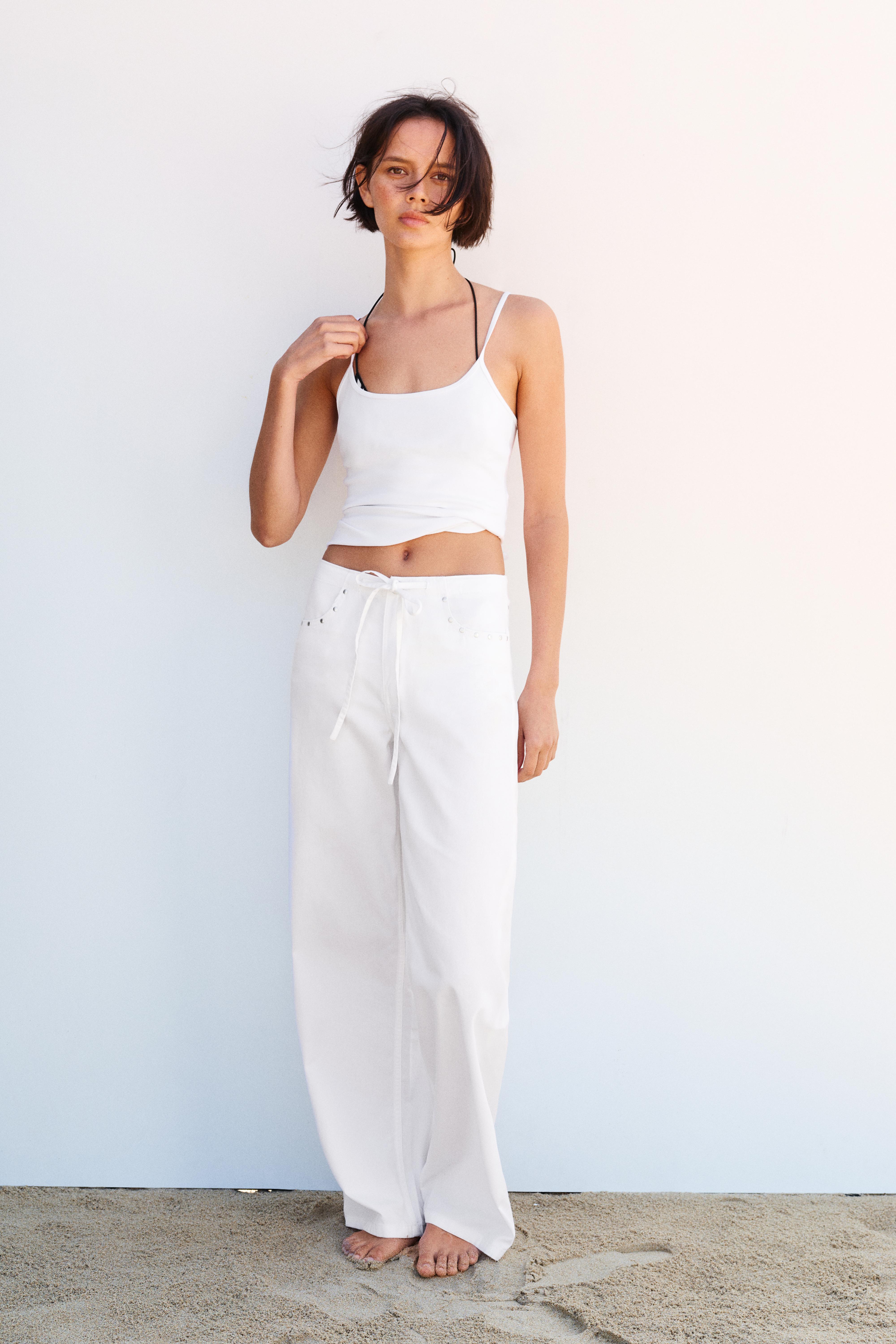 White studded baggy jeans — White