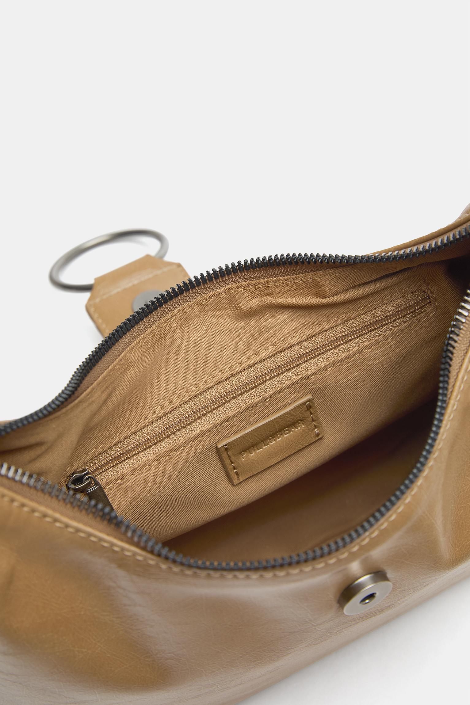 Crossbody bag with buckle — Leather