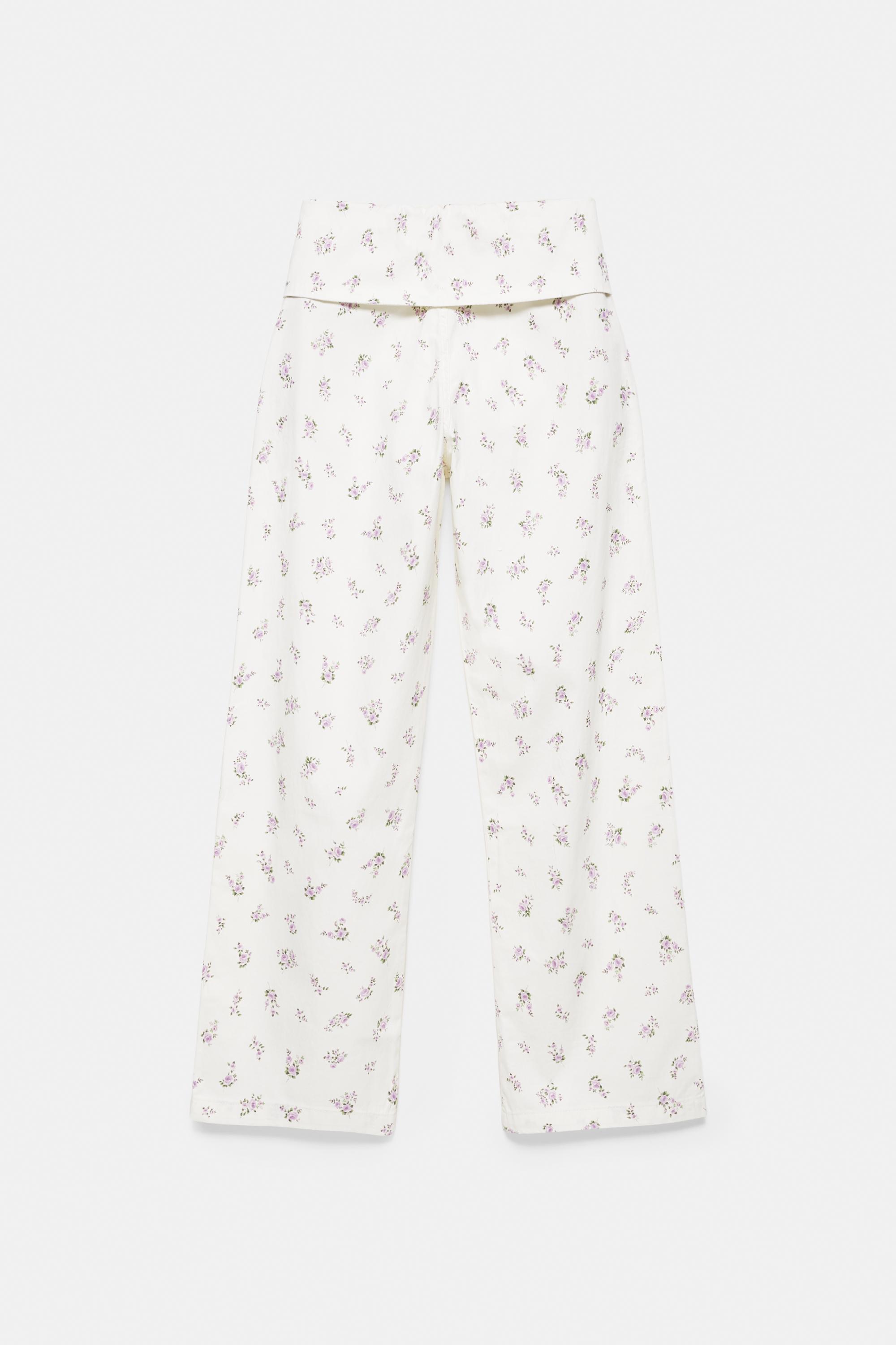 Floral trousers with turn-up waist — White