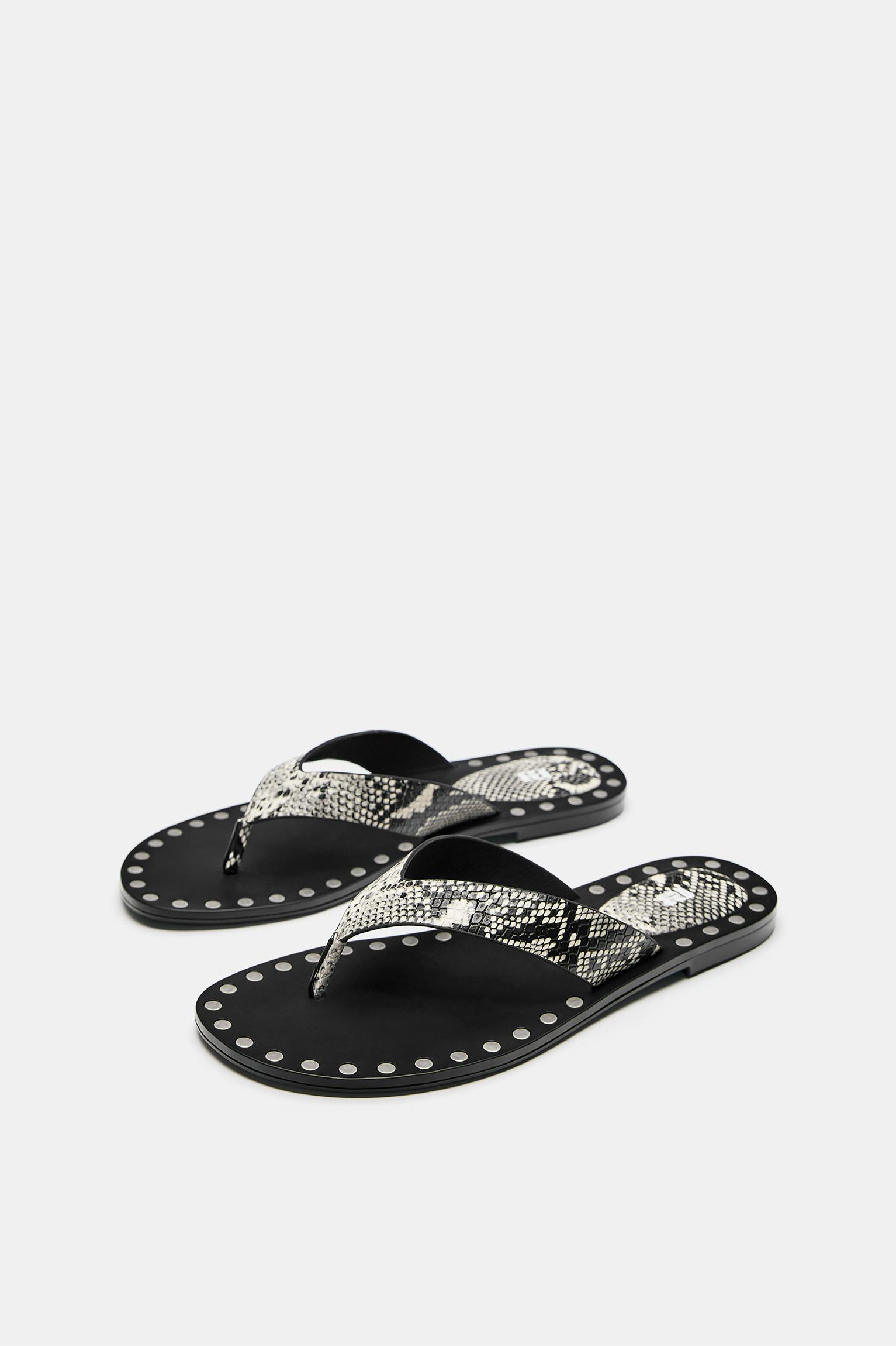 Flat studded sandals — Contrast