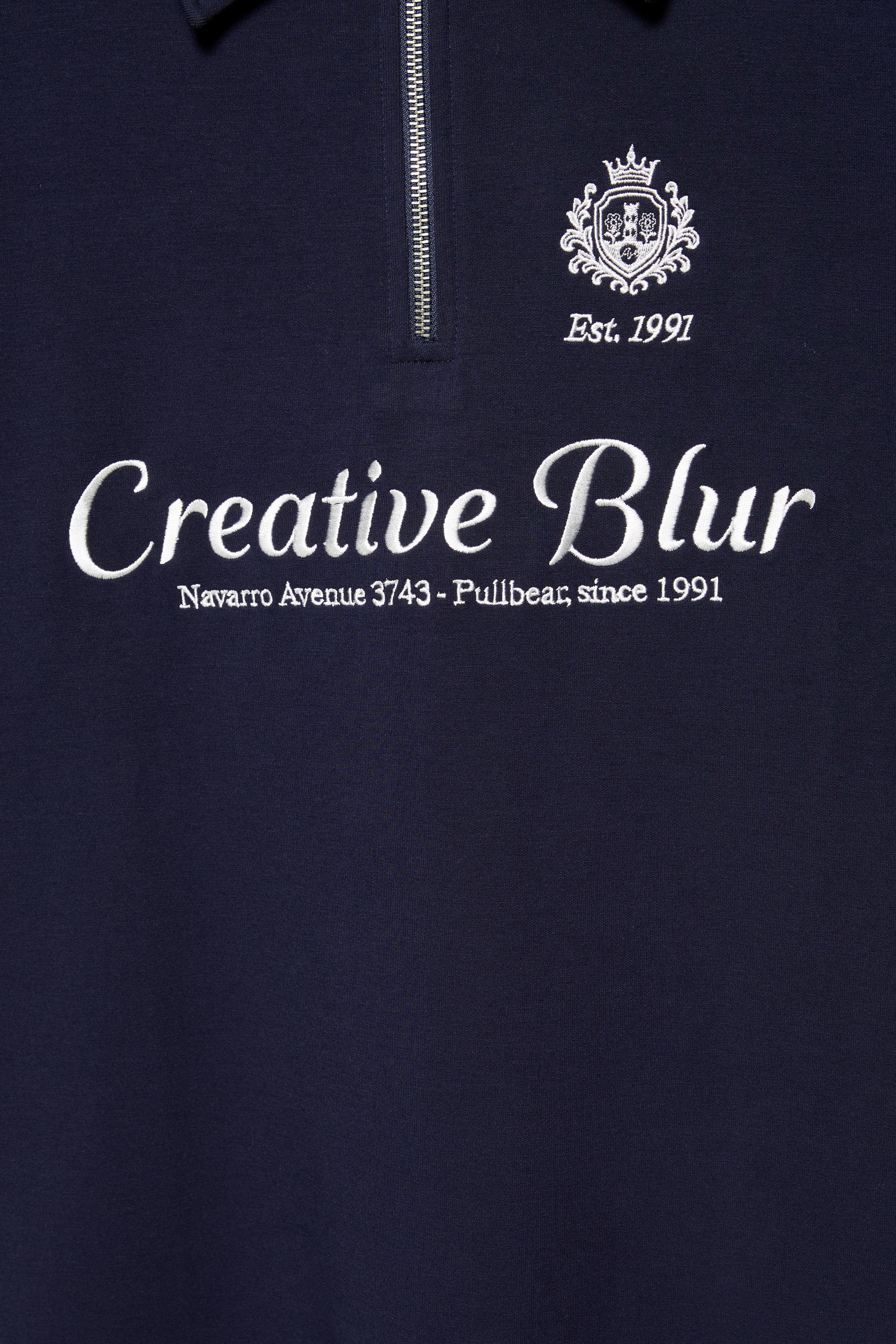 Interlock graphic polo shirt with zip — Navy