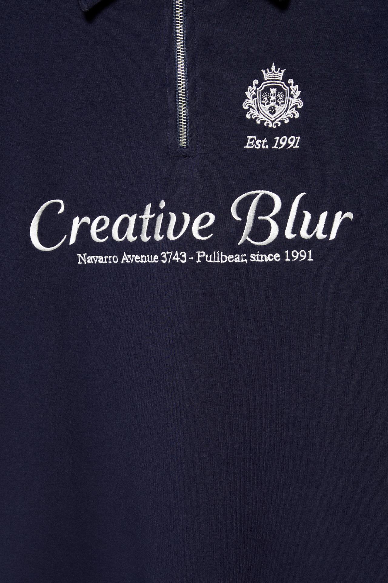 Interlock graphic polo shirt with zip — Navy