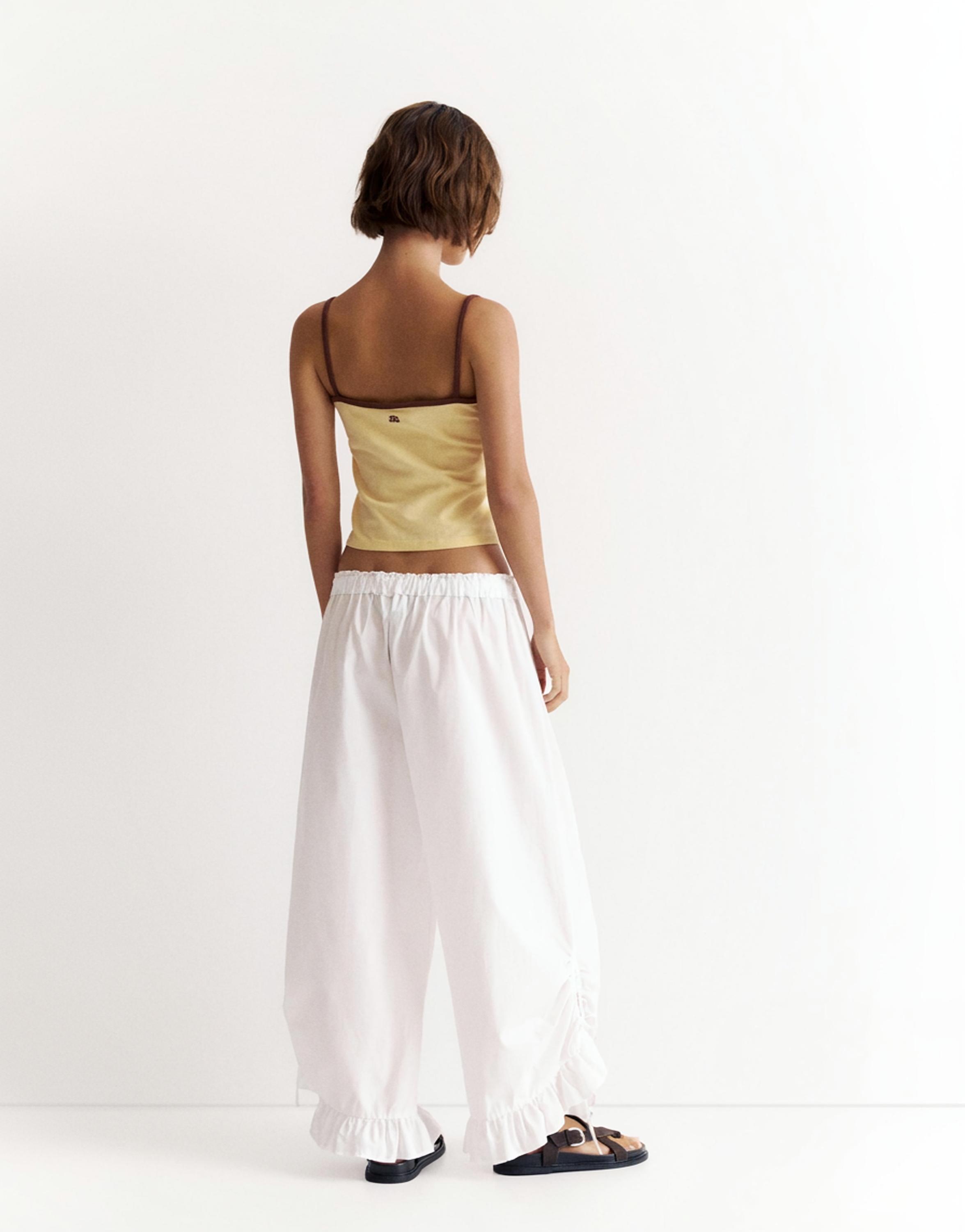 Hibiscus flower strappy top — Yellow